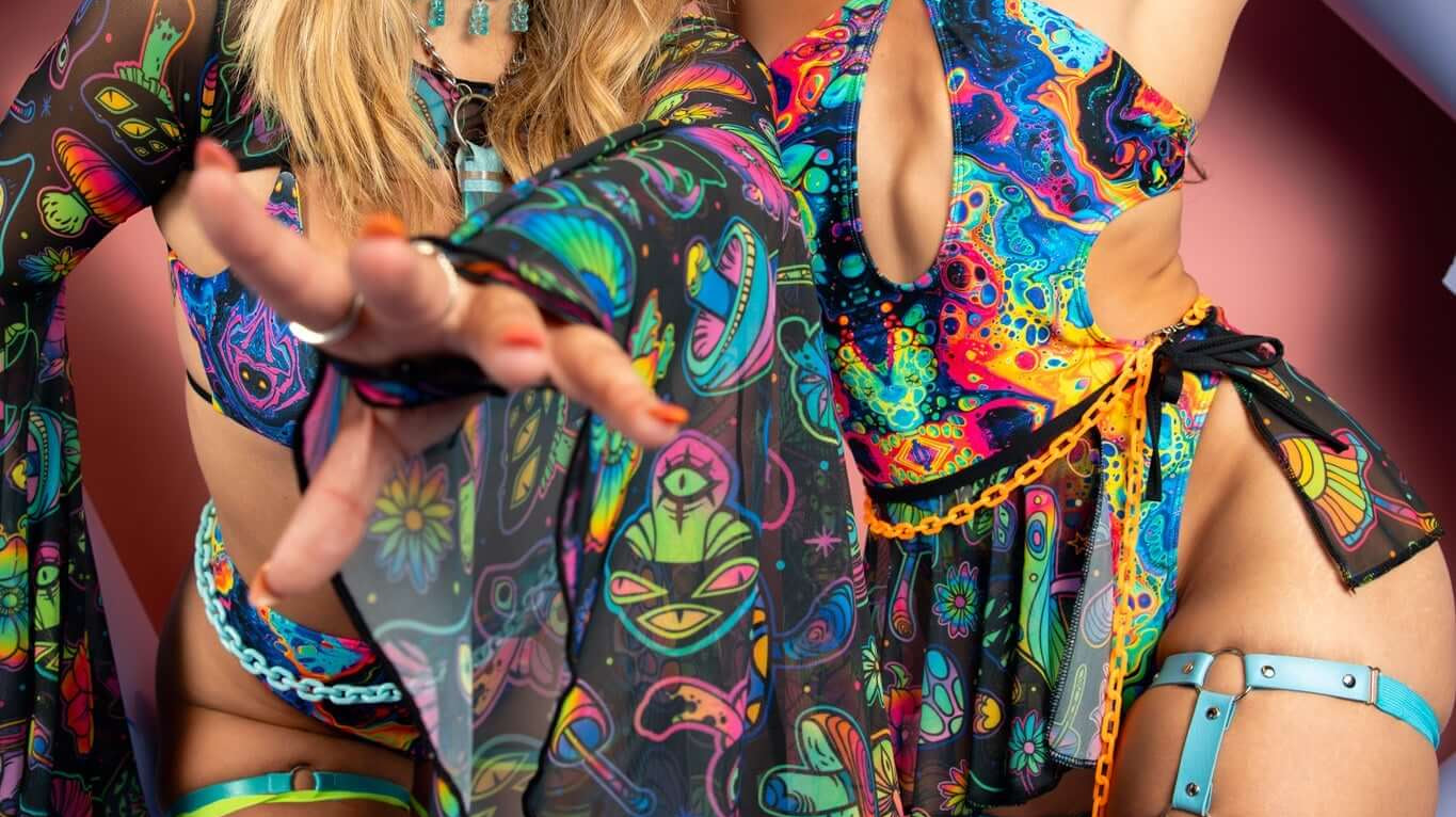 Save Big on Exclusive Festival Fashion Two women wearing vibrant rave outfits