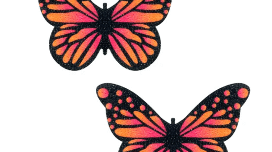 Colorful butterfly stickers in vibrant orange and pink hues, perfect for rave outfits and summer festival fashion.