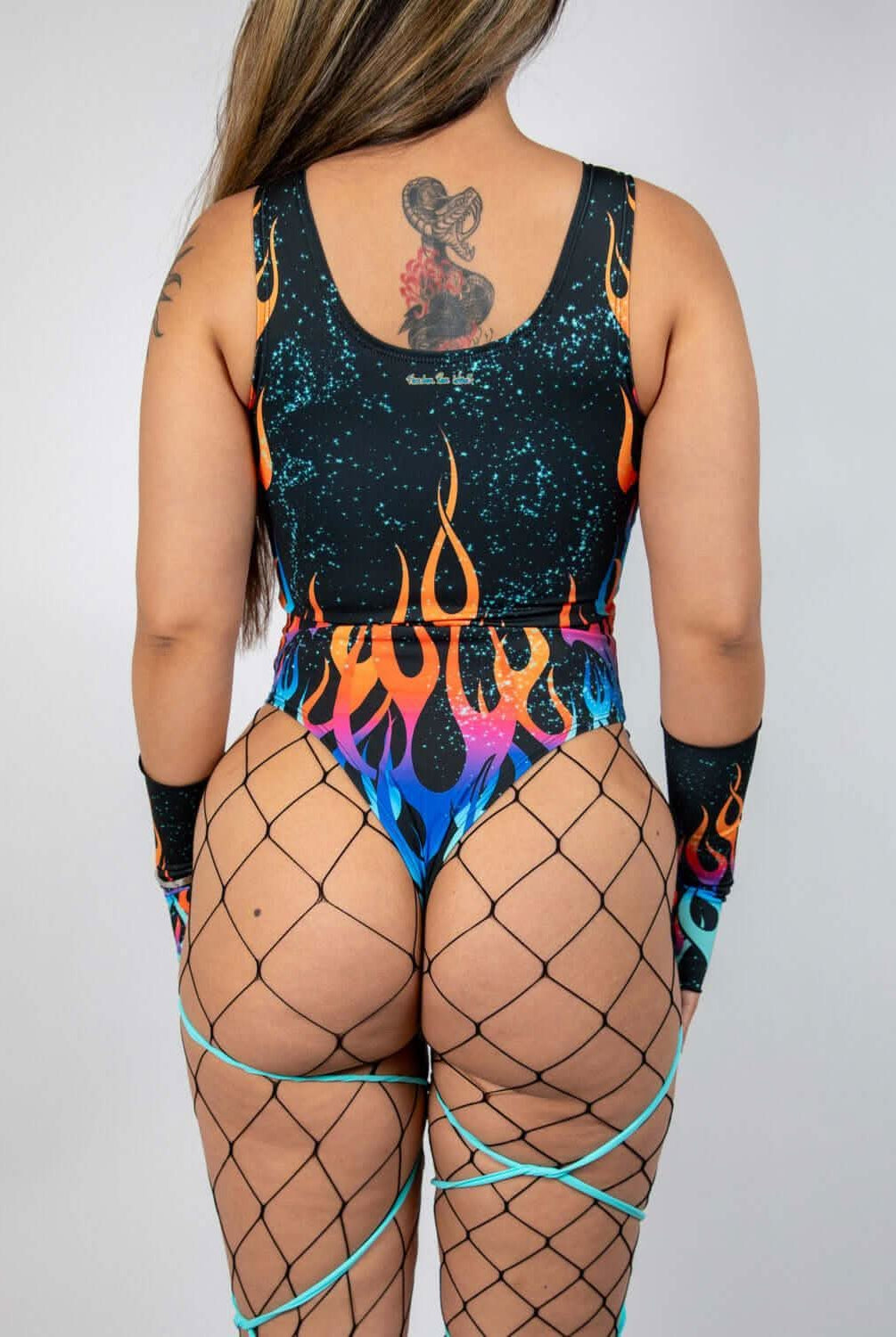 Back view of Blaze Keyhole Bodysuit featuring fiery ombré flames and double keyhole cutouts, ideal for rave outfits.