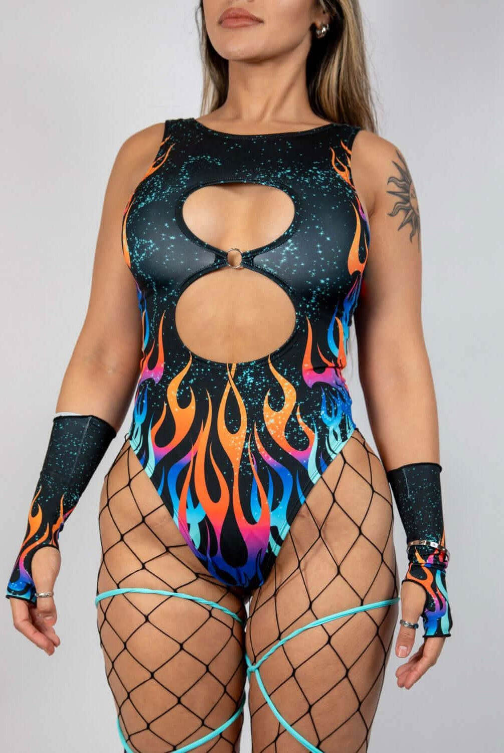 Flame-patterned Blaze Keyhole Bodysuit perfect for rave outfits, featuring double keyhole cutouts and O-ring detail.