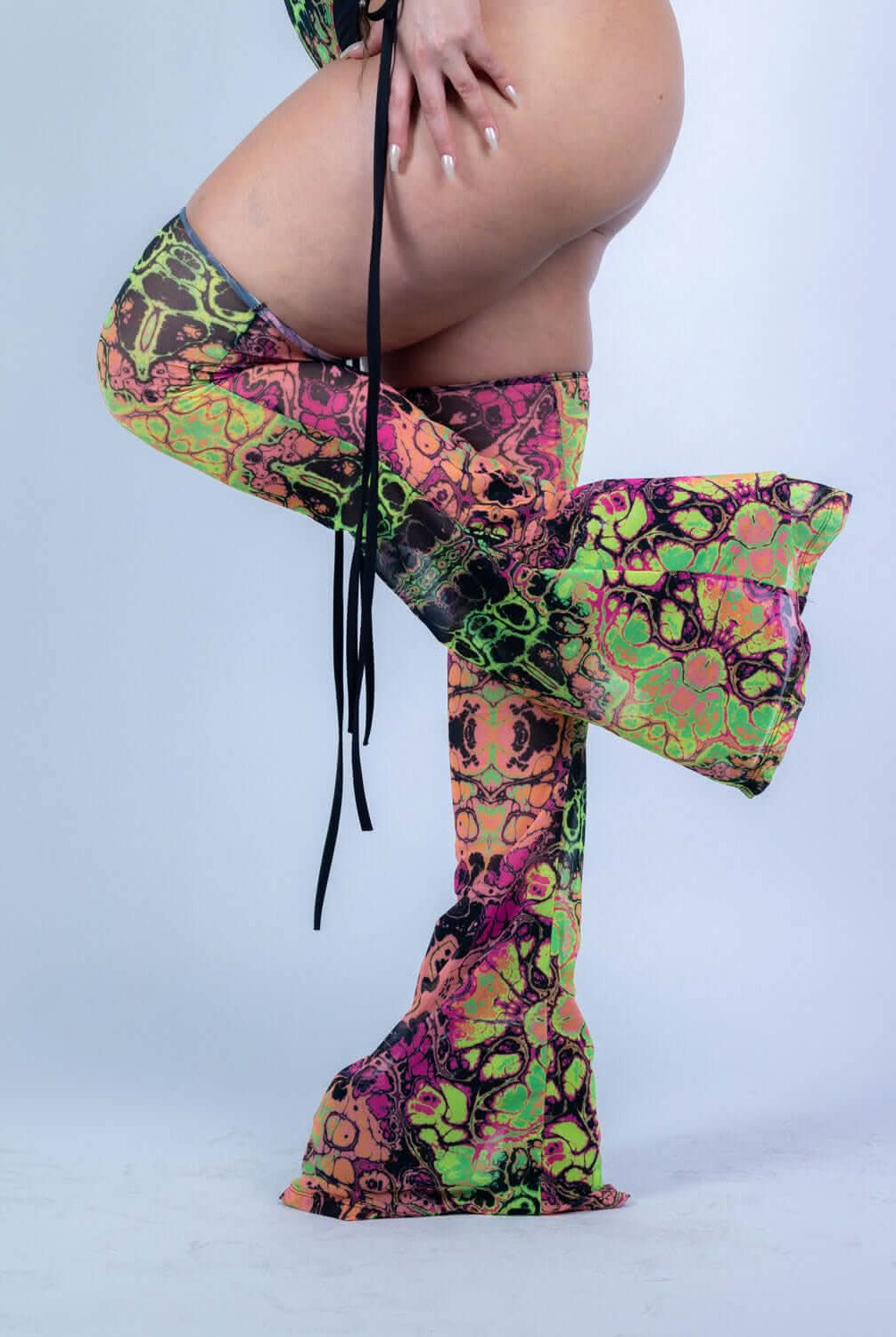 Intensity Cross Faded Bodysuit Set featuring vibrant UV-reactive leg sleeves, perfect for rave outfits.