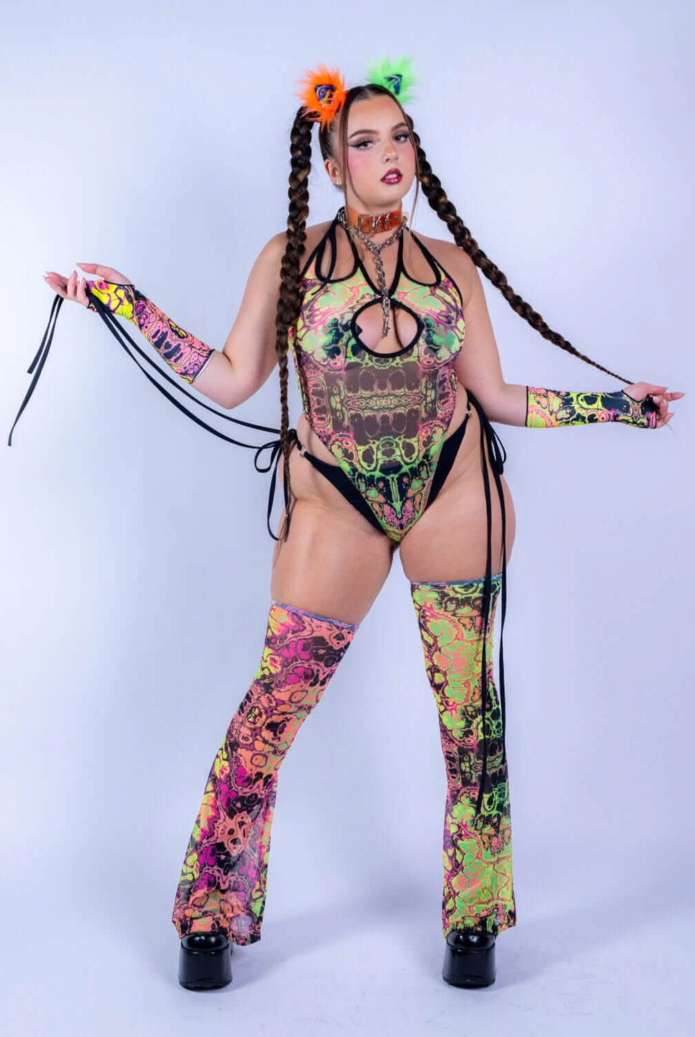 Intensity Cross Faded Bodysuit Set showcased in vibrant UV-reactive prints, perfect for rave outfits.