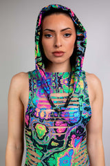 Model showcasing Freedom Rave Wear's neon hood featuring vibrant floral patterns, paired with a separate psychedelic bodysuit.