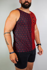 Model wearing a black and red geometric tank top with bold patterns, ideal for raves. Freedom Rave Wear provides unique festival fashion.