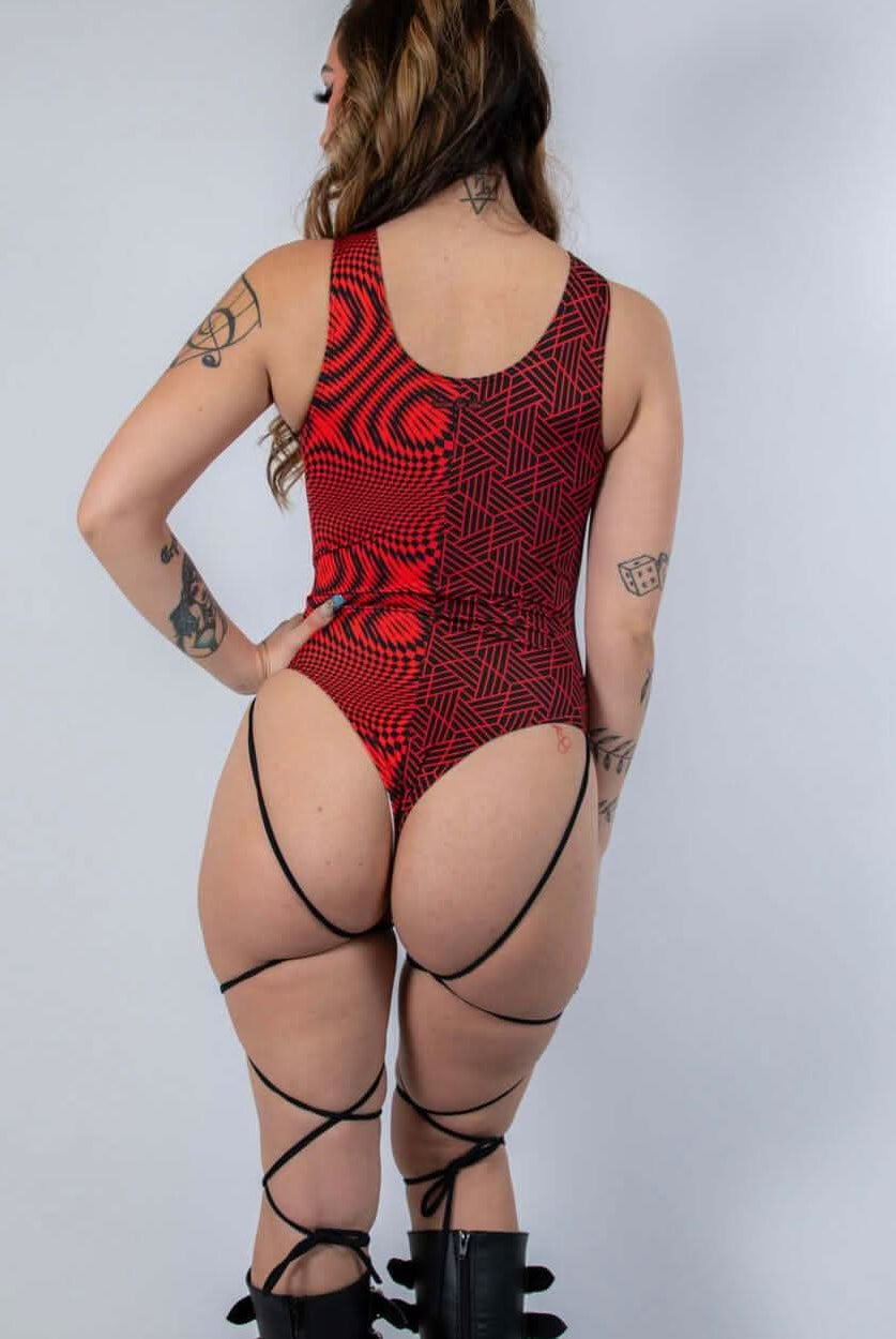 Back view of Amplitude High Neck Bodysuit in red and black with leg straps, perfect for rave outfits.