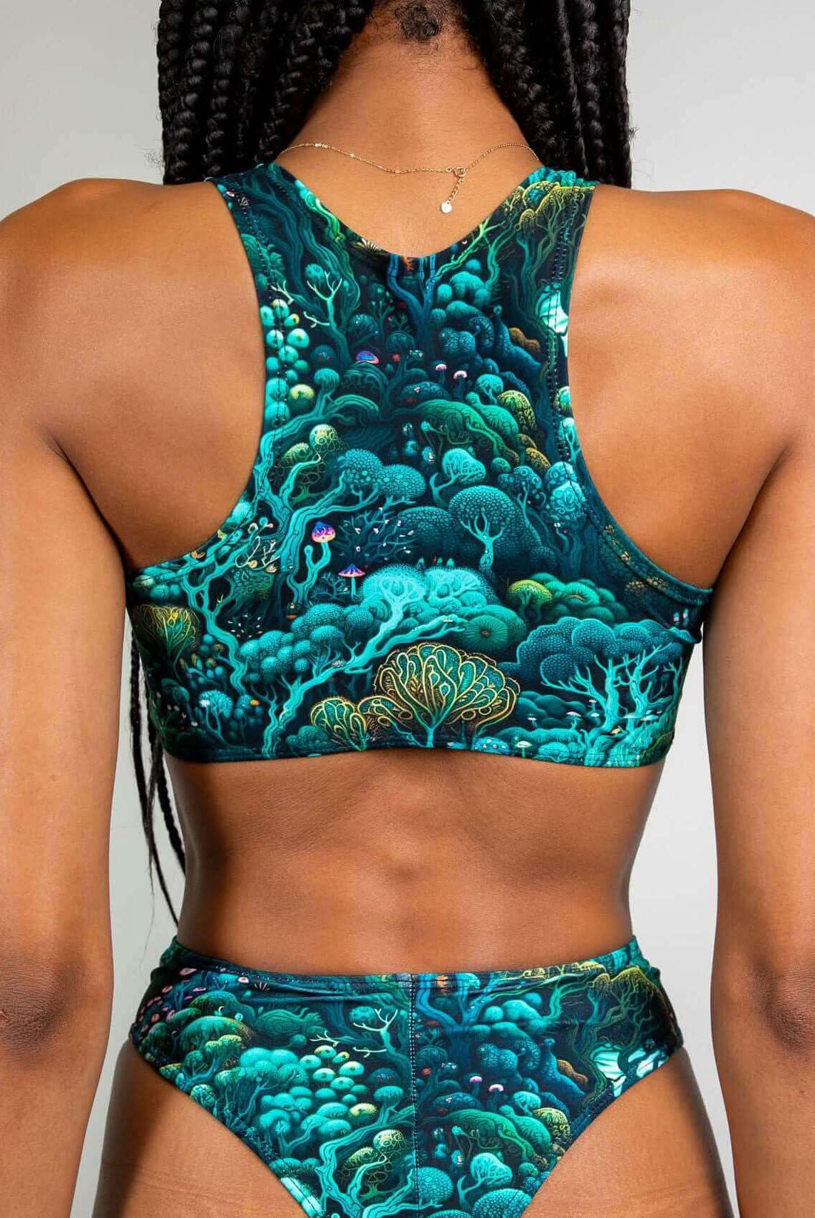 Back view of the Faewood Keyhole Top featuring a vibrant forest print, perfect for rave outfits and eco-friendly fashion.