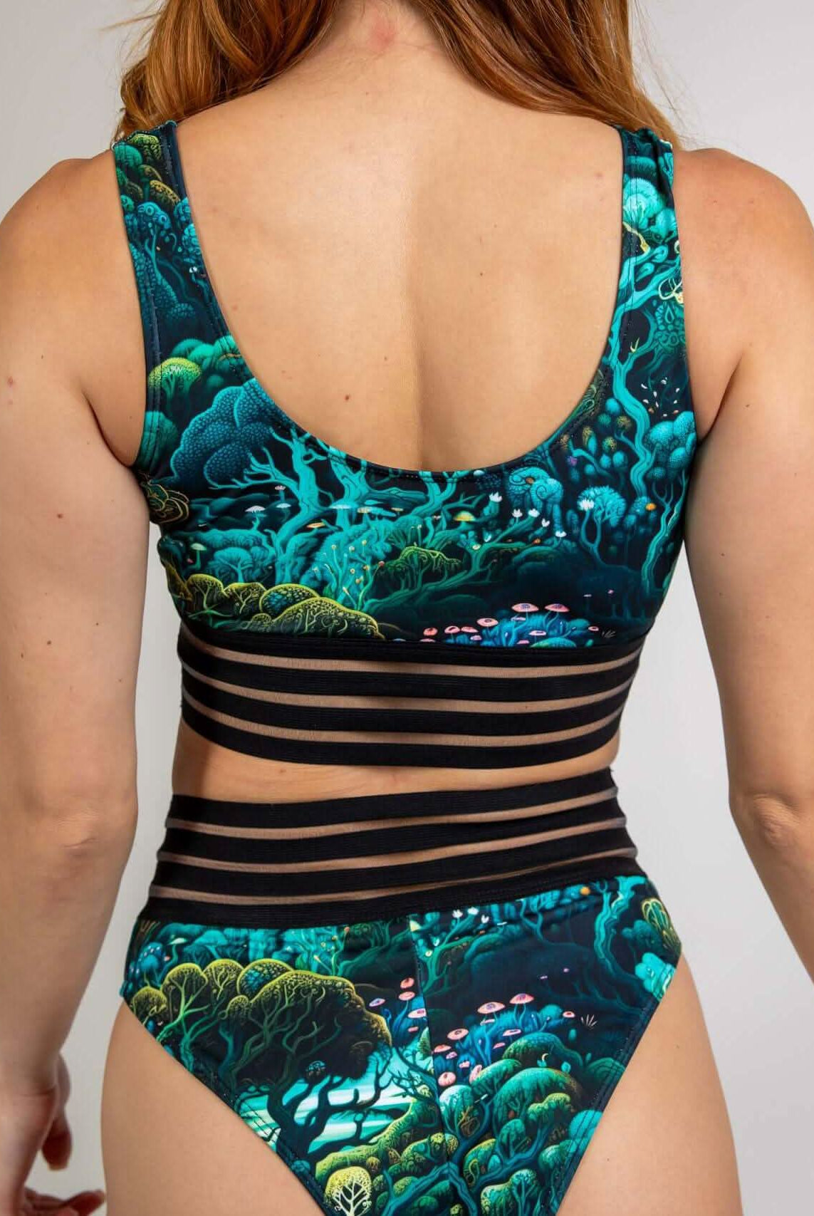 Faewood Sporty Top featuring vibrant forest design, perfect for workouts and rave outfits. Sustainable material used.