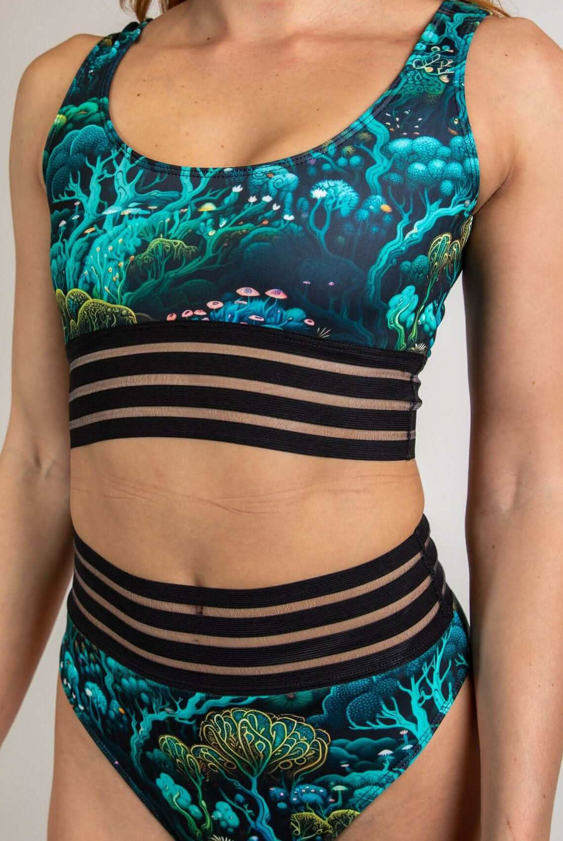 Faewood Sporty Top featuring vibrant forest design, supportive wide elastic bands, ideal for workouts and rave outfits.