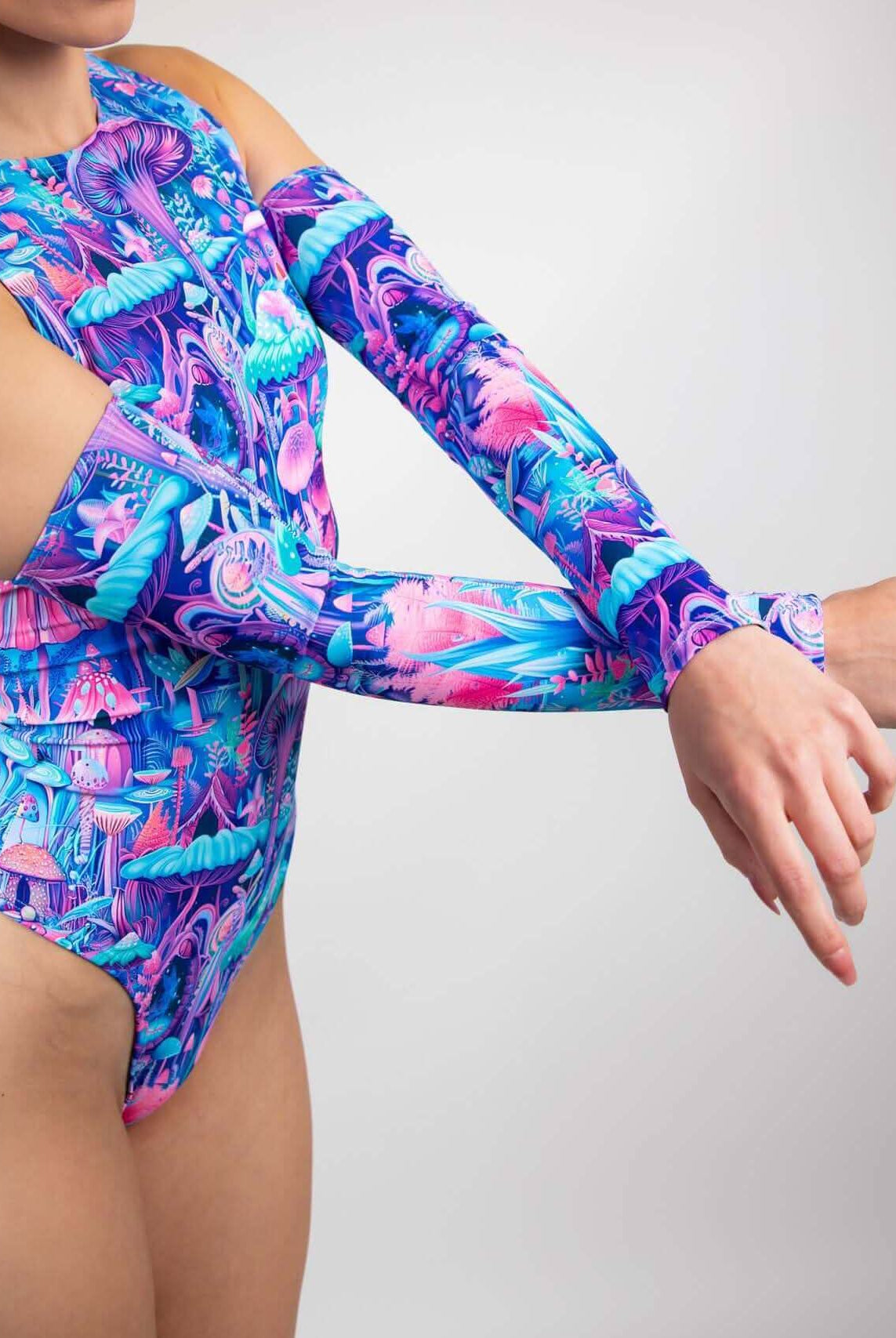 Model showcasing colorful fairycore arm sleeves, perfect for rave outfits, with a cozy fit and vibrant design.