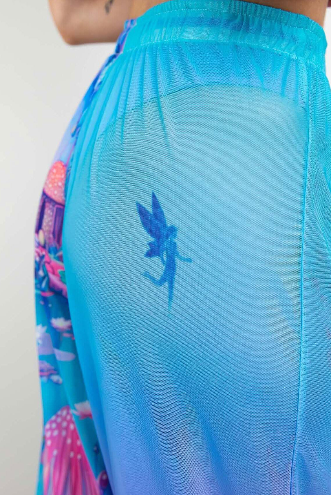 Fairycore Mesh Lucy Pants featuring playful prints and a whimsical fairy design on a sheer fabric. Perfect for rave outfits.