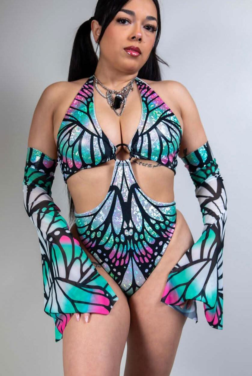 Model showcasing Flutter Metamorphosis Sleeves with butterfly pattern, perfect for rave outfits and trendy clothing.