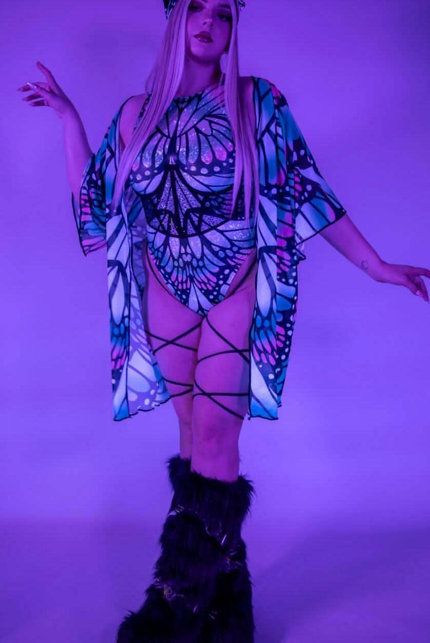 Model wearing Flutter Short Mesh Robe in butterfly design with rave accessories, perfect for rave outfits and beach style.
