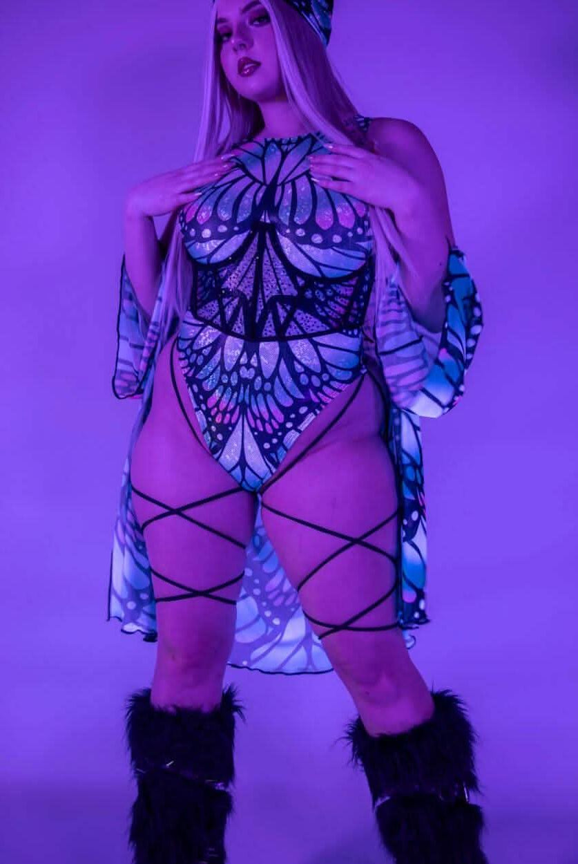Flutter Sideboob Bodysuit with butterfly print and leg straps, perfect for rave outfits and unique style.