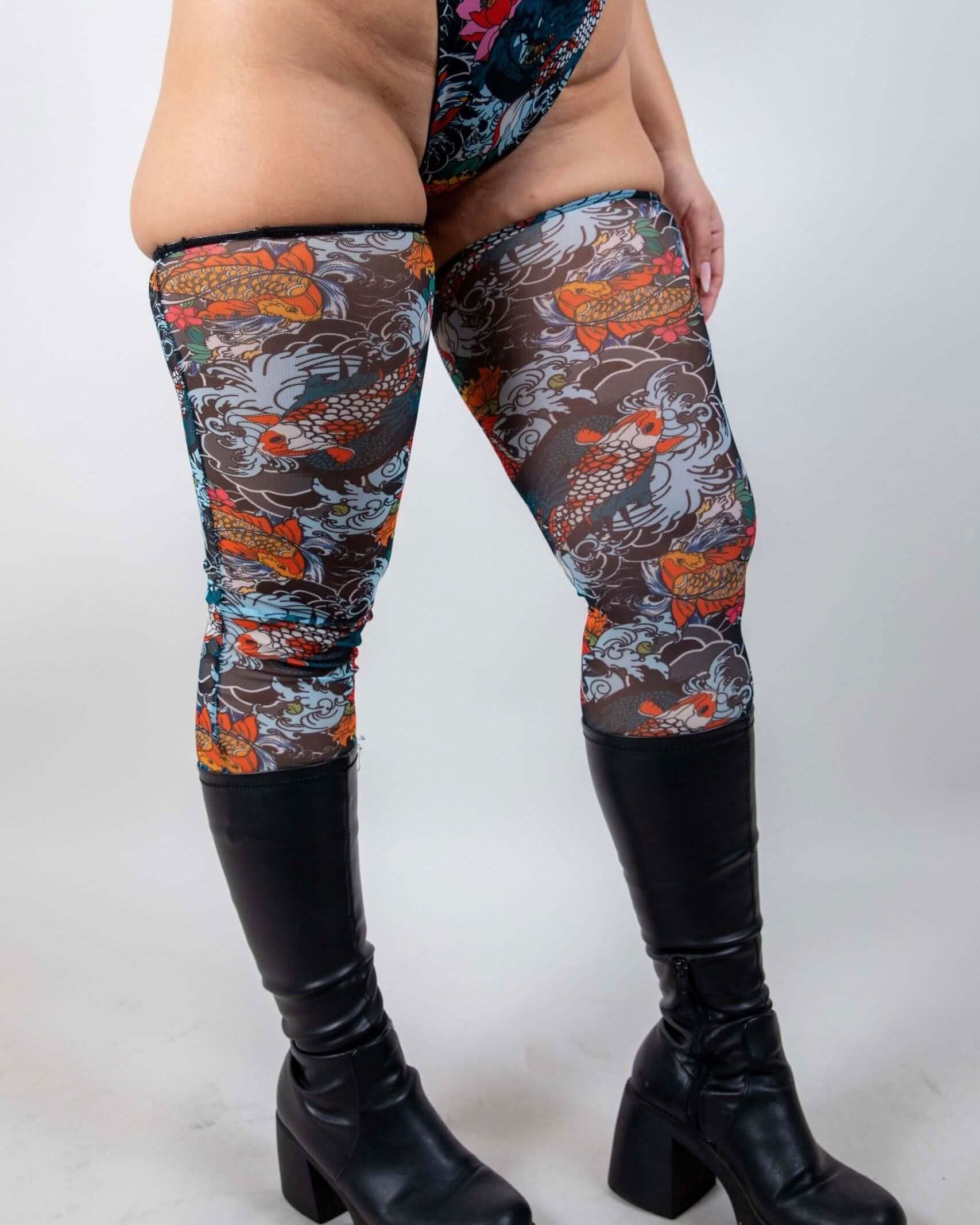Close-up of Good Fortune Mesh Leg Sleeves, highlighting the sheer mesh fabric and vibrant tattoo-inspired design.