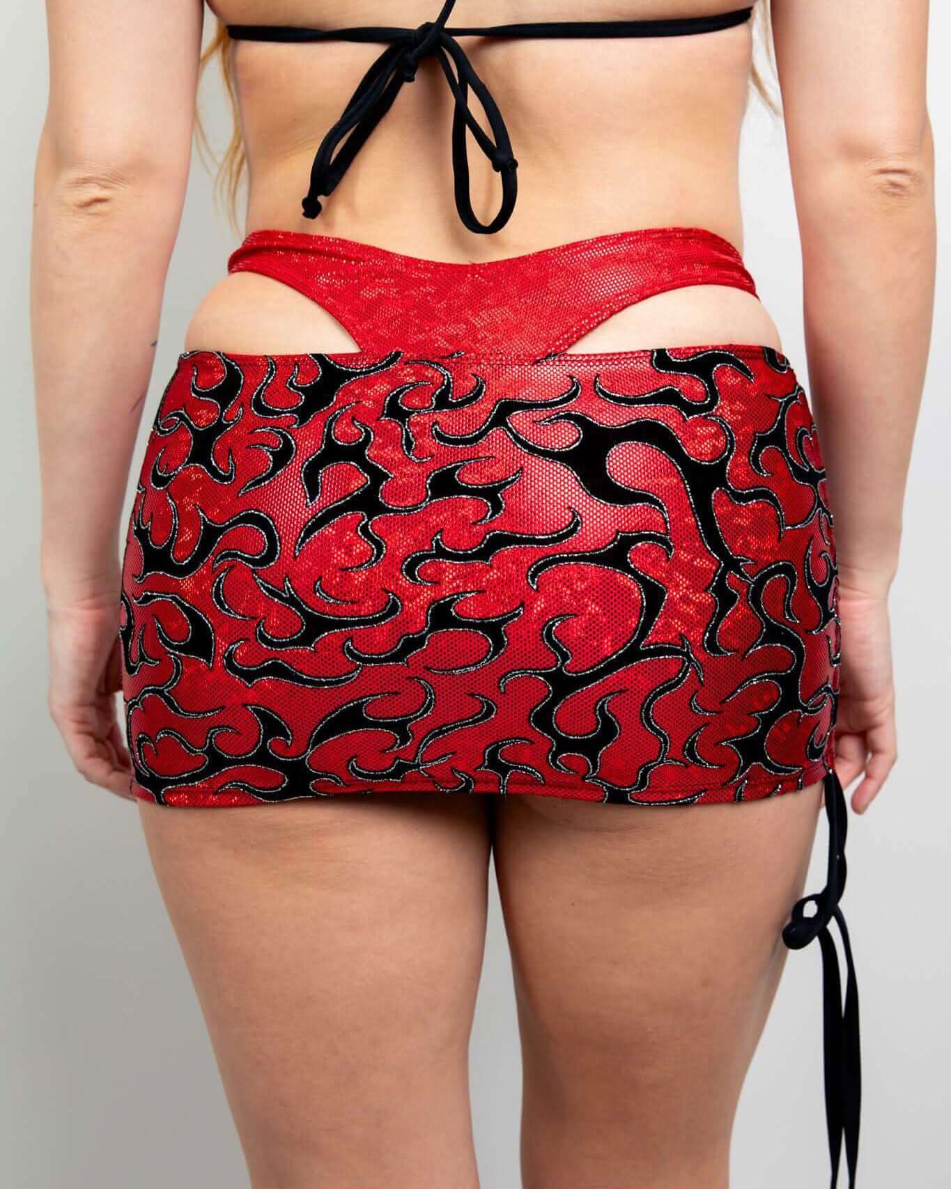 Red Inferno Cinch Skirt showcasing adjustable ties and a ruched effect, perfect for rave outfits.