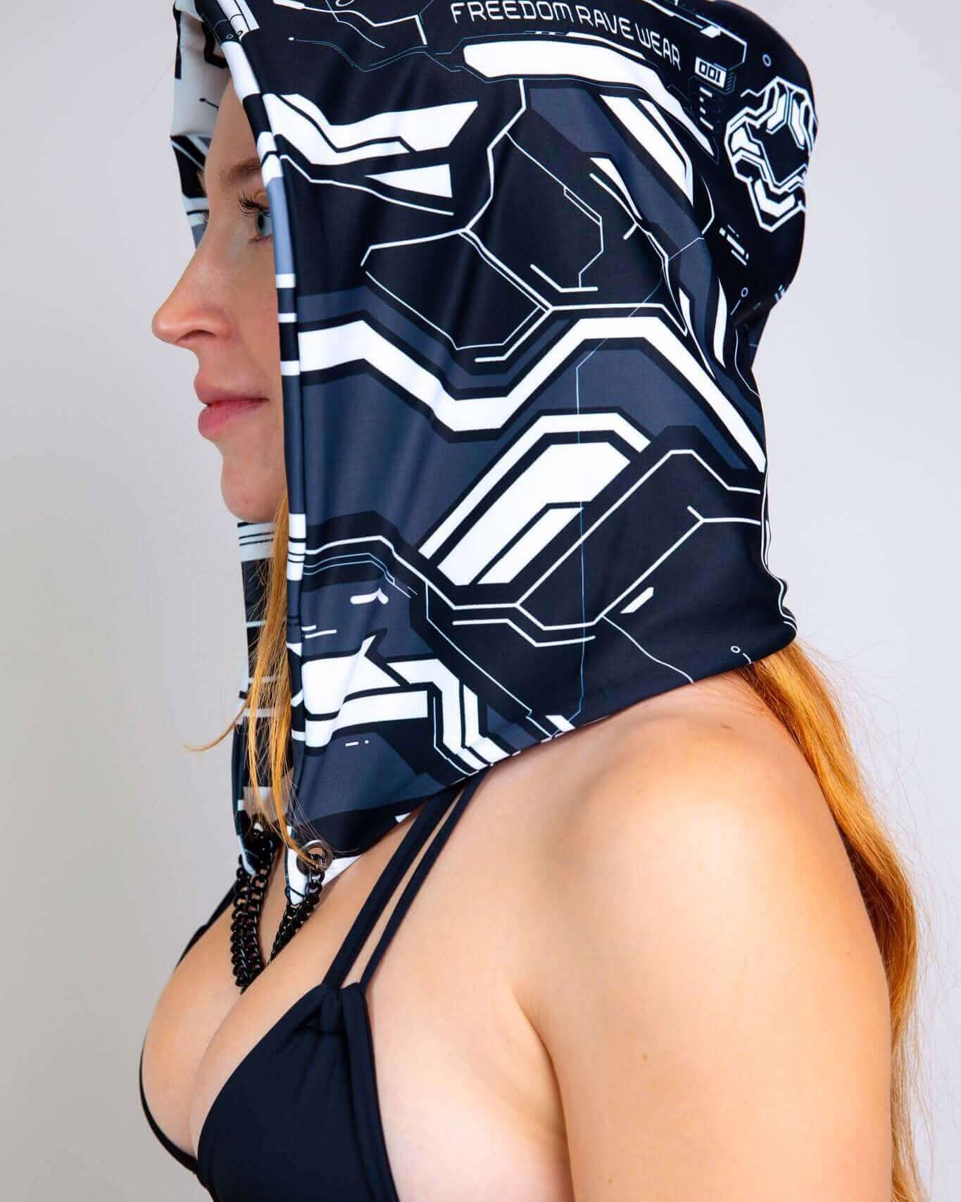 Mechanoid Reversible Hood worn by model, showcasing its stylish design and secure fit, perfect for rave outfits.