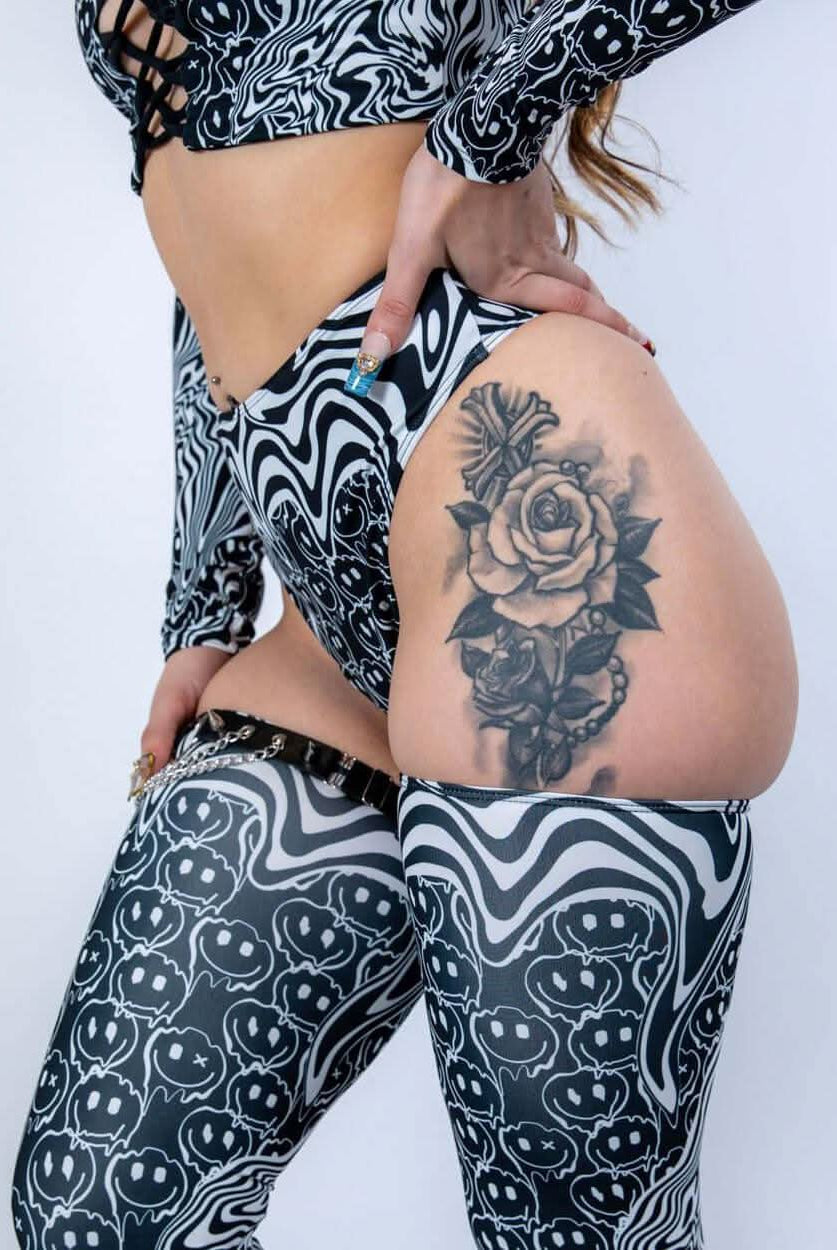 Side angle of the Meltdown High Waisted Thong, showing the cheeky cut and curve-enhancing fit in melty pattern fabric.