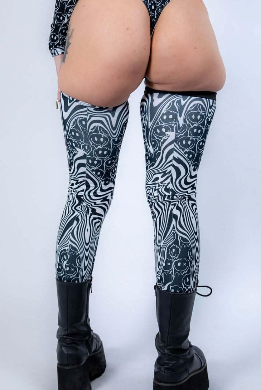 Back view of Meltdown Leg Sleeves, revealing the high-rise style and trippy pattern flowing from thigh to boot.