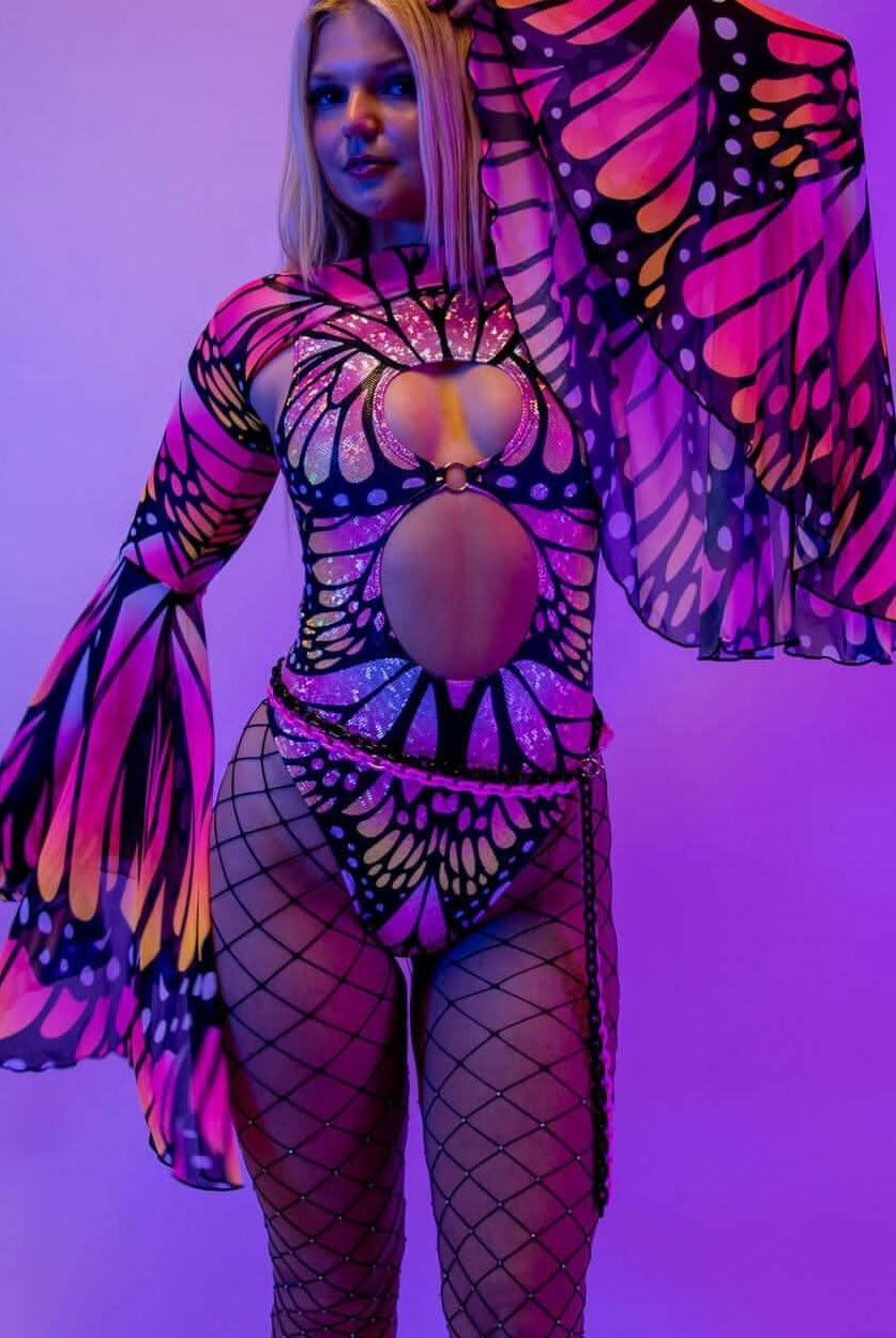 Model showcasing Monarch Mesh Bell Sleeves with neon butterfly design, perfect for rave outfits and colorful rave clothing.