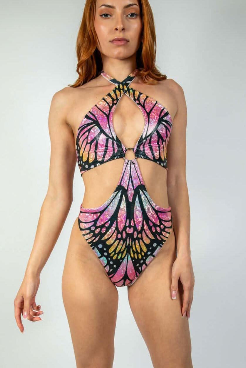 Model wearing a colorful Monarch O-Ring Bodysuit, showcasing rave outfits and versatile rave clothing style.