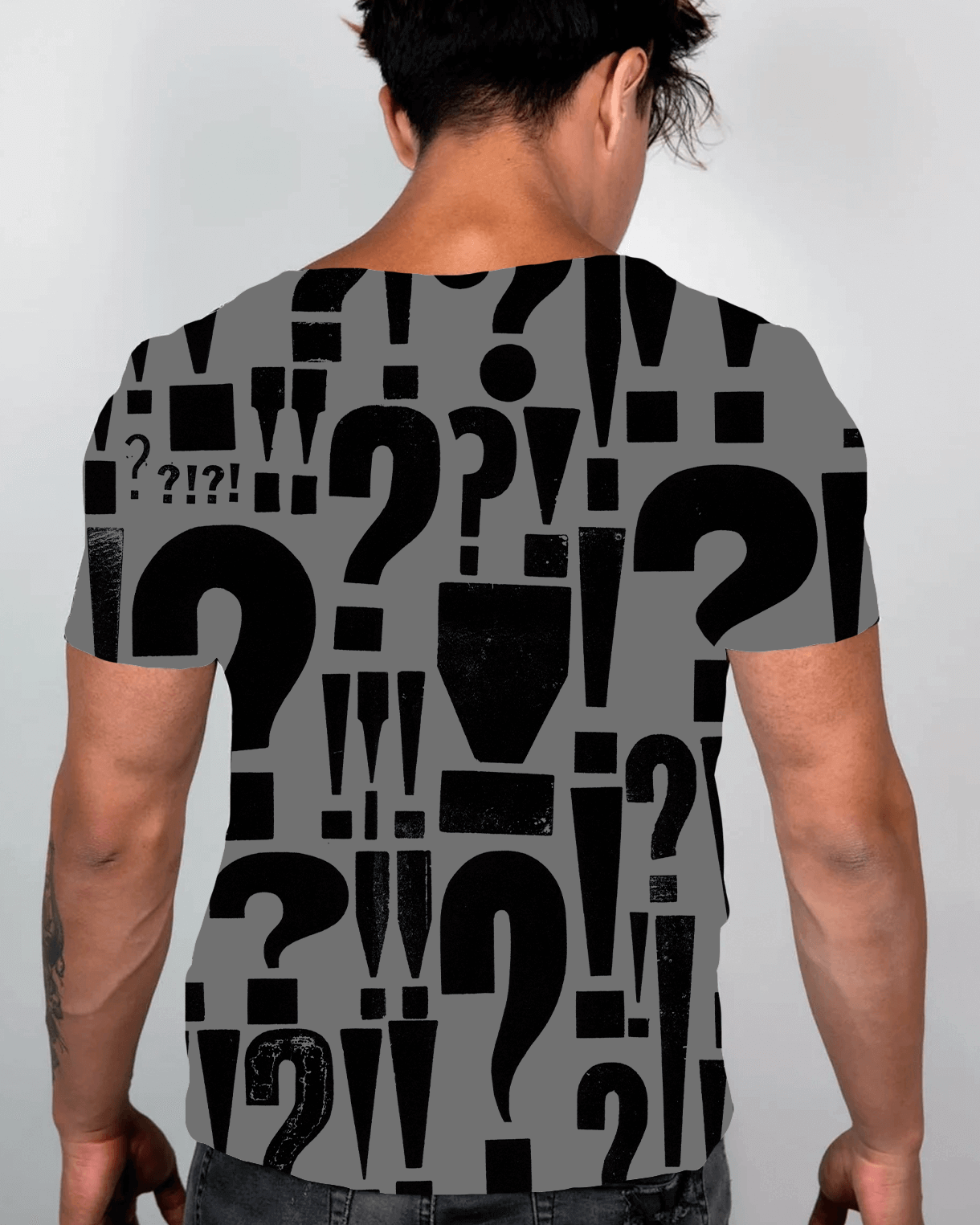 Mystery Unisex Top featuring a playful pattern of question marks and exclamation points, perfect for unique rave outfits.