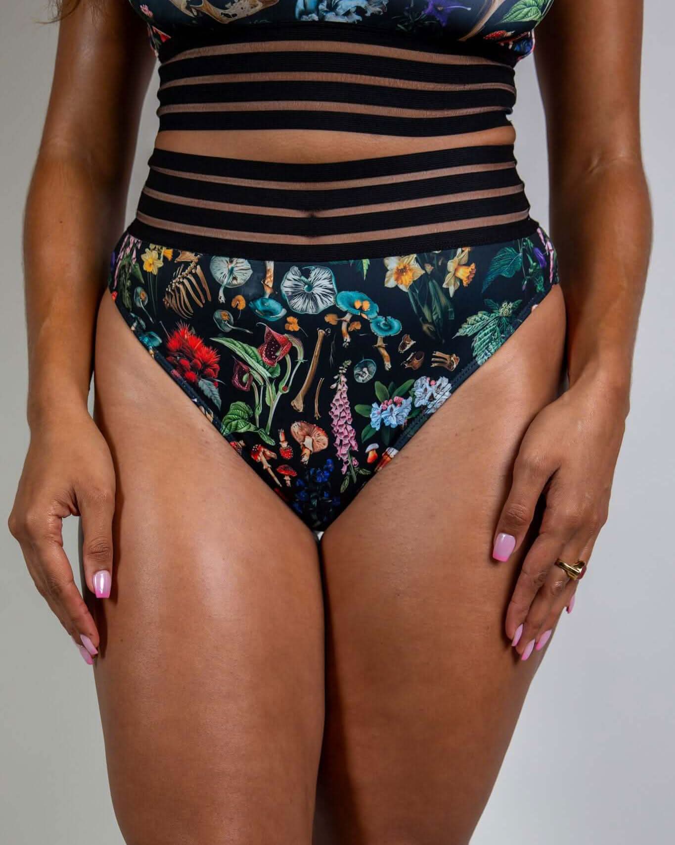 Poison Sporty Bottoms with skull and mushroom print, high-waisted fit, perfect for rave outfits.