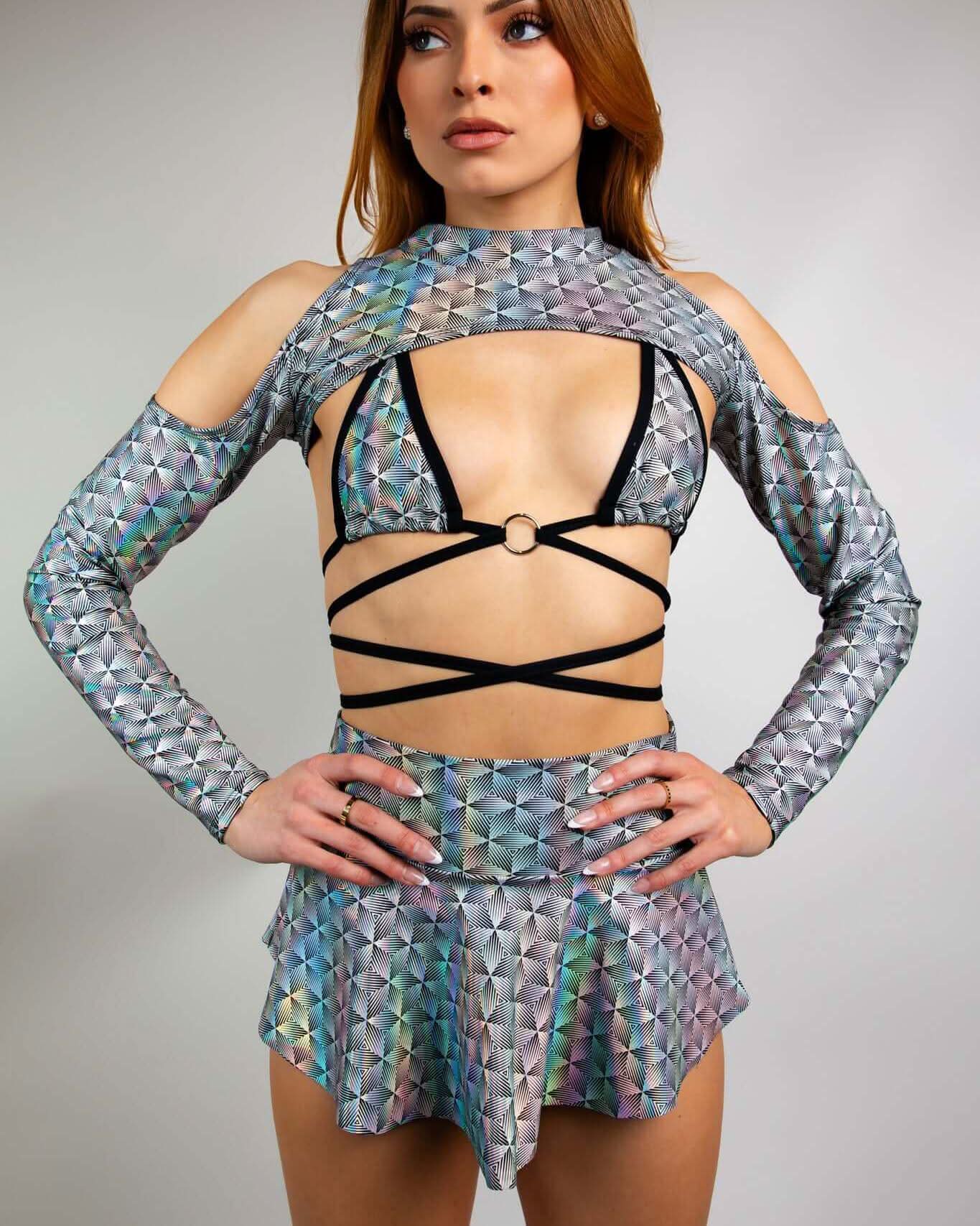 Model showcasing Prism Spectra Sleeves, a radiant addition to rave outfits with a futuristic design and shoulder cutouts.
