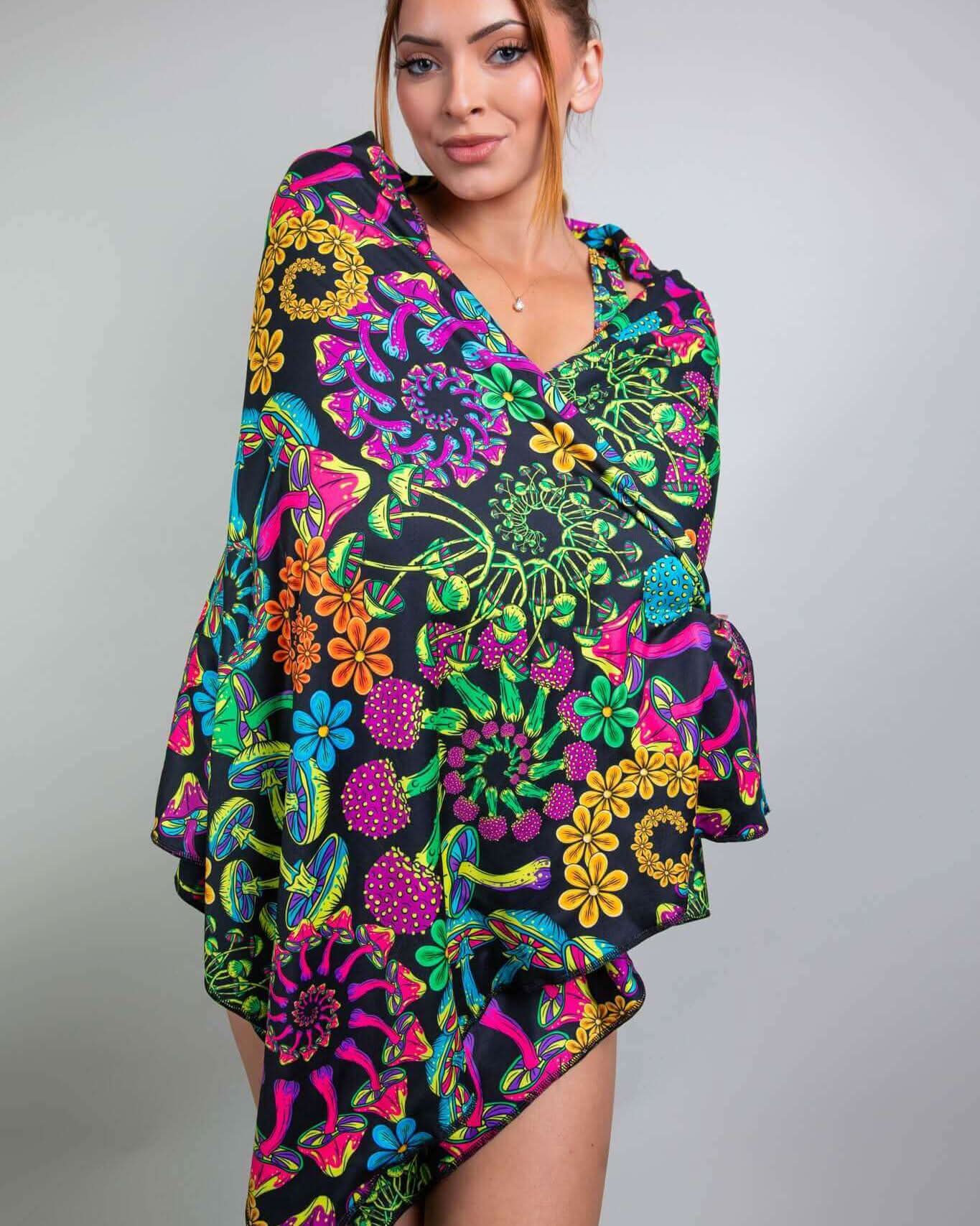 Model wearing the PsyBloom Festival Scarf, showcasing vibrant floral patterns perfect for rave outfits and festivals.