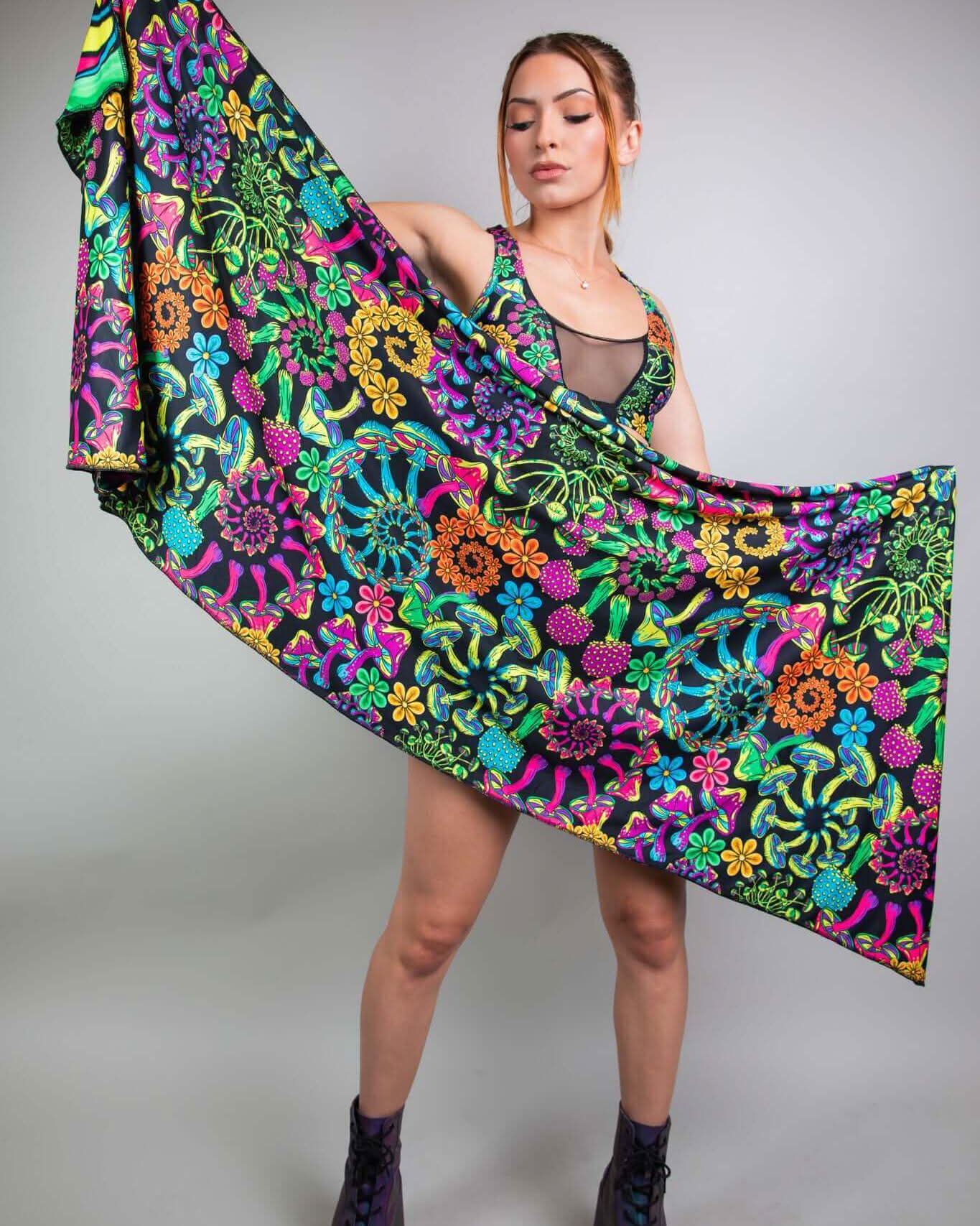 Model showcasing vibrant PsyBloom Festival Scarf with colorful floral design, perfect for rave outfits.