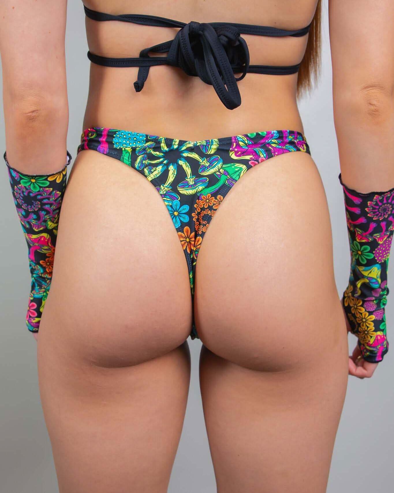 PsyBloom psychedelic thong bottoms with colorful floral print, perfect for raves and festival outfits.