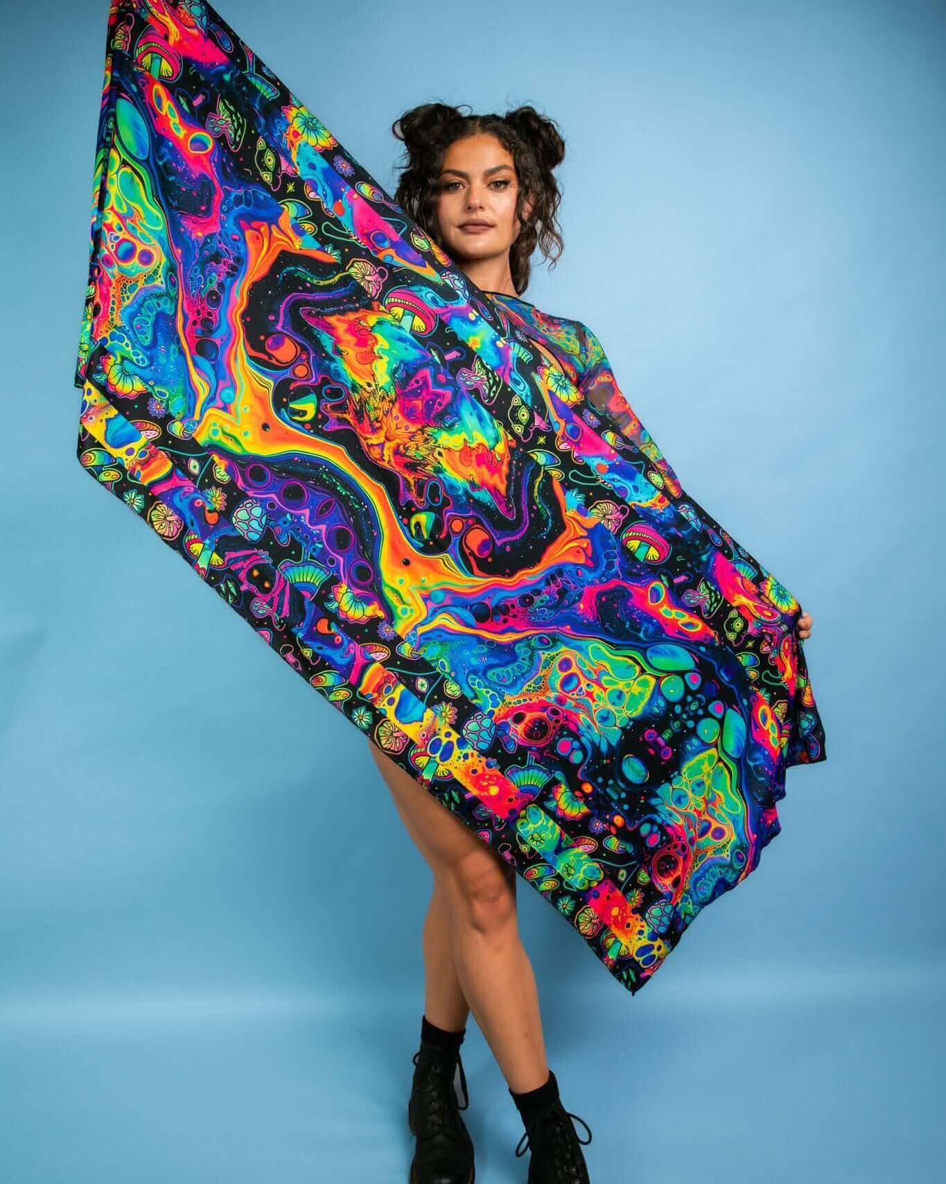 Model showcasing the Vivid Shroomie! Festival Scarf in colorful, psychedelic patterns, perfect for rave outfits and festivals.