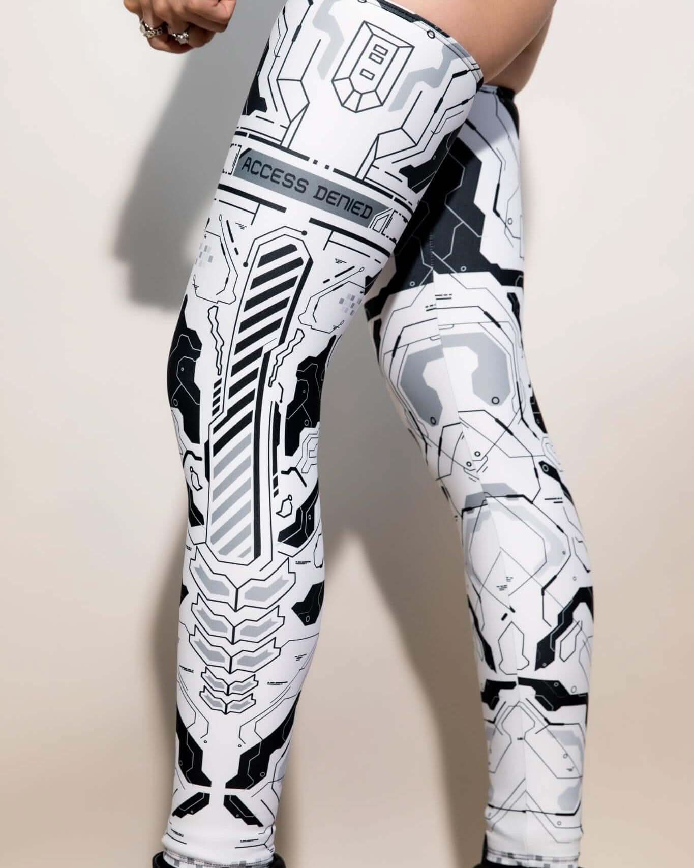 Mechanoid Leg Sleeves in white featuring futuristic design, perfect for rave outfits and festival wear.
