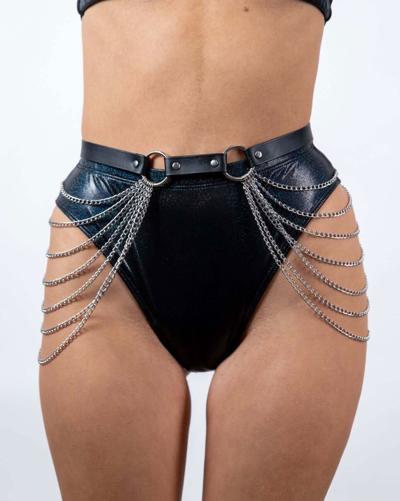 Black faux leather high-waisted bottoms with chain detailing, perfect for rave outfits and festival style.