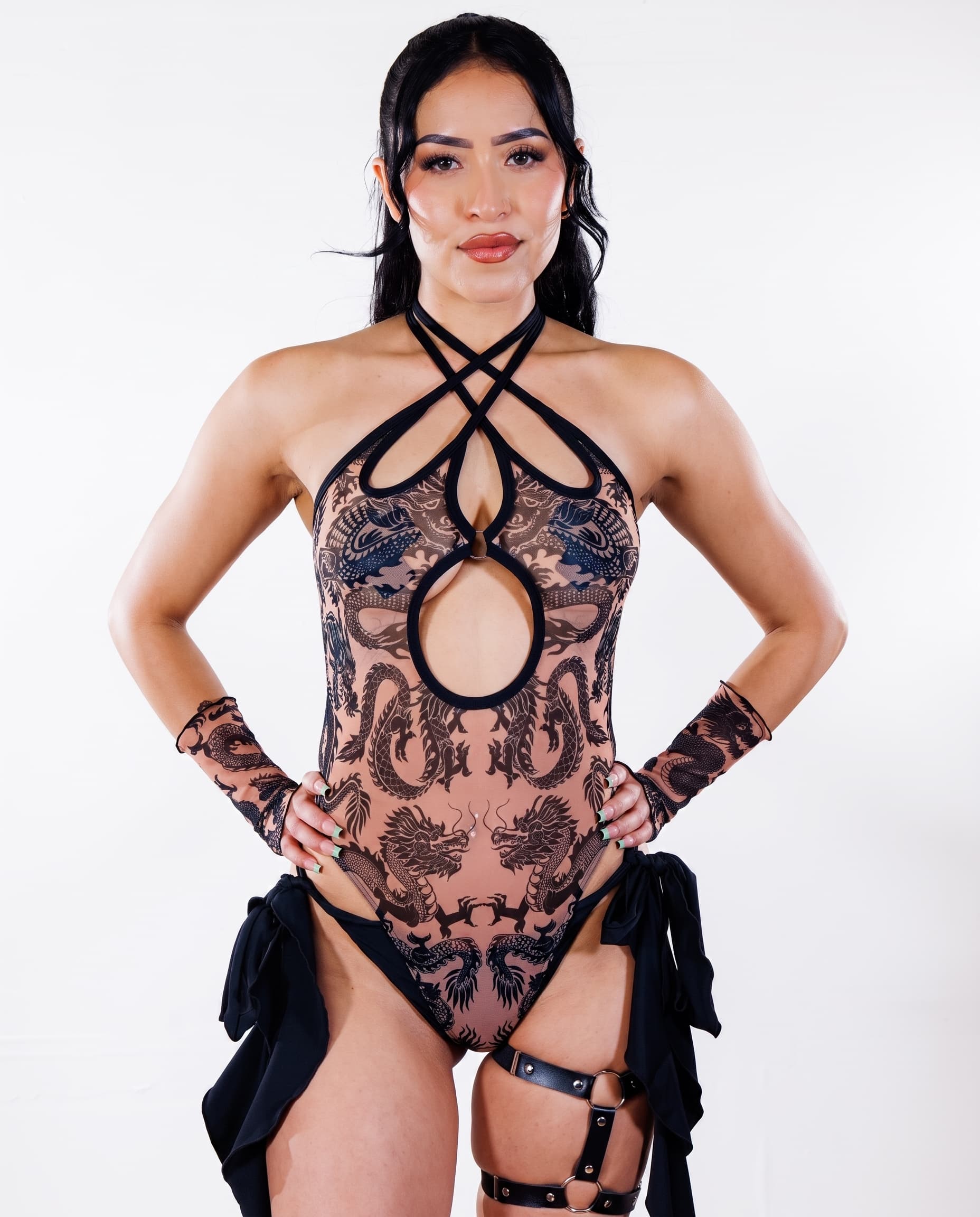 Dynasty Nude Cross Faded Bodysuit, front view showing dragon print, crossed halter straps and chest cutouts