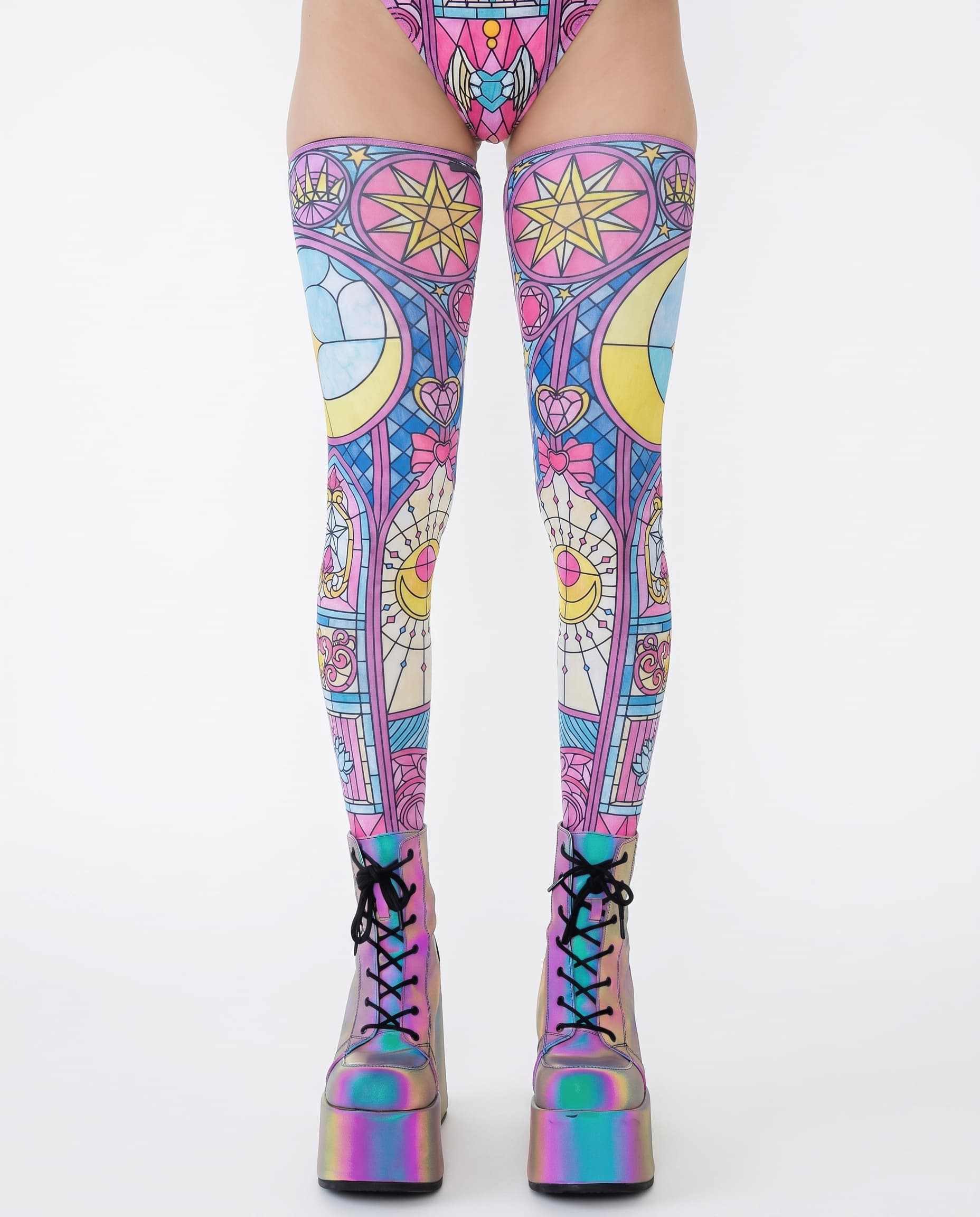 Moonlight Leg Sleeves, front view showing pastel moon and star patterns with iridescent platform boots