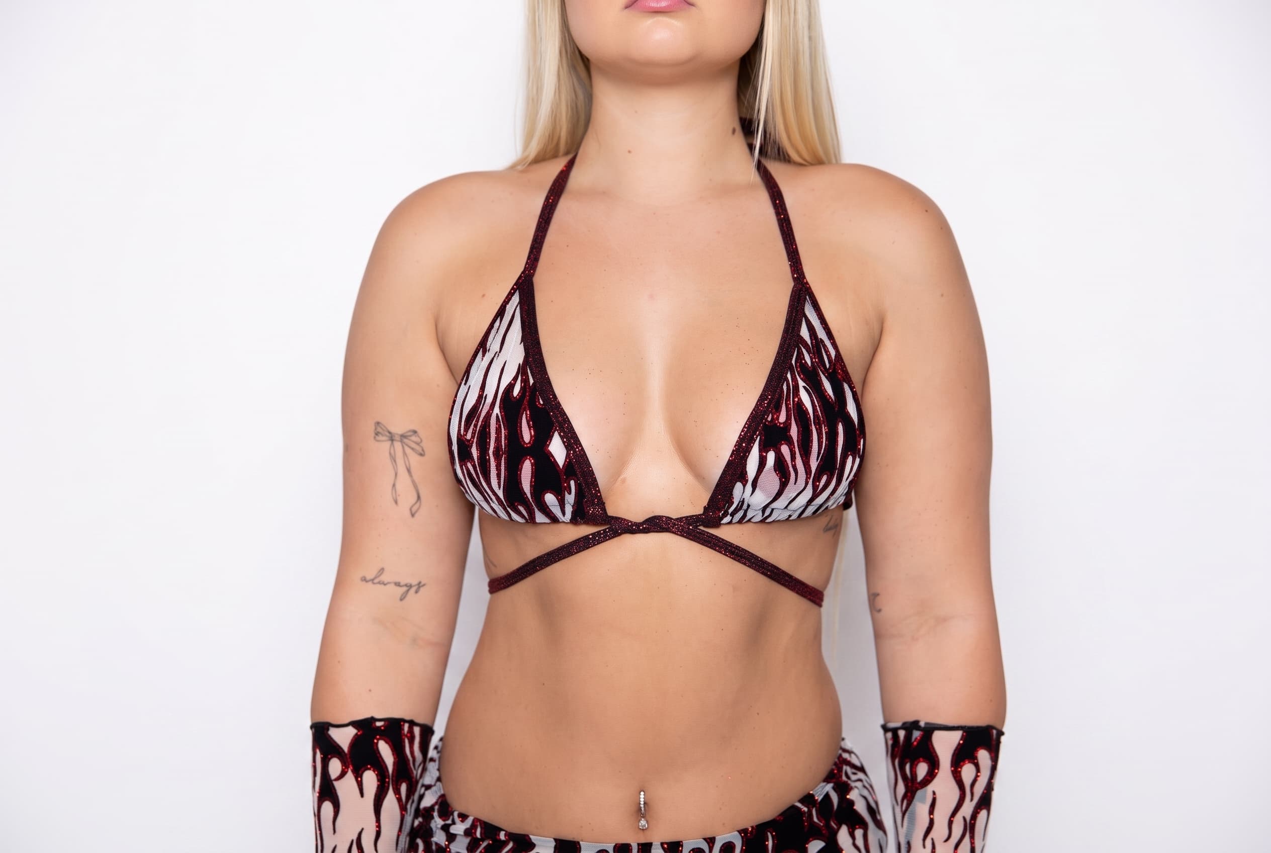 Twin Flames White Wrap Bikini Top, front view showing flame-print triangle cups and red crossed wrap straps