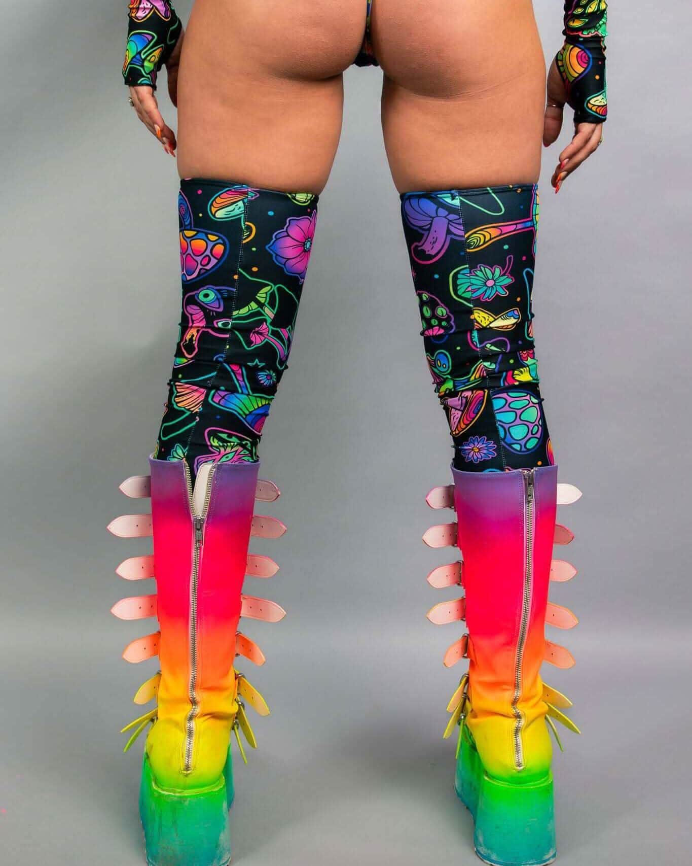 Rave arm sleeves and leg sleeves set in Shroomie psychedelic print with rainbow spike boots back view