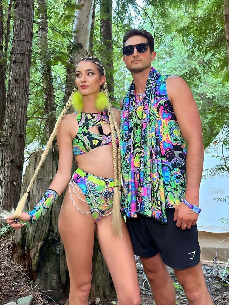 Shambhala 2024 attendees in vibrant, eco-friendly rave outfits from Freedom Rave Wear, made from recycled materials in San Diego