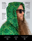 Close-up of a model wearing the Dominion Assassin Hood featuring oversized hood shape and unique green pattern, perfect for rave outfits.