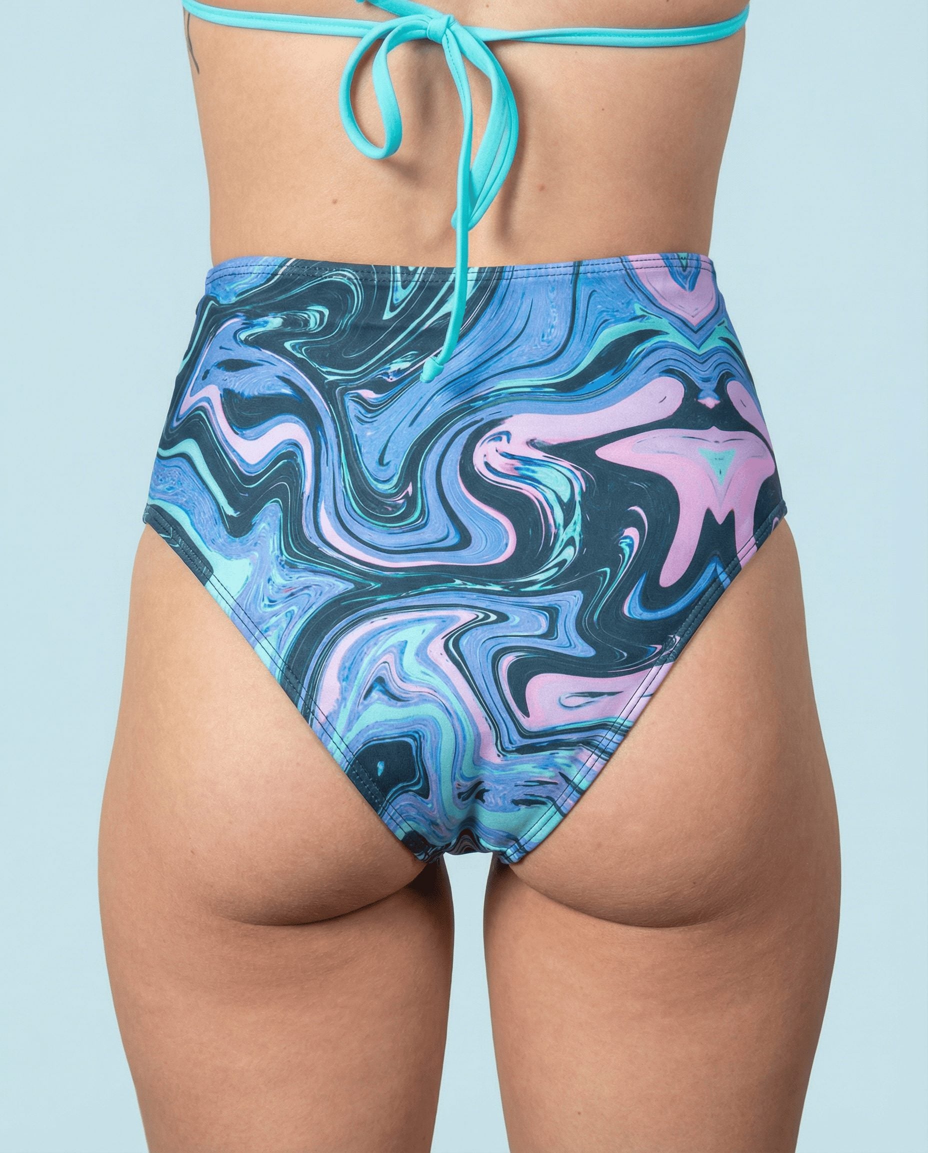 Glacial High Waisted Bikini Bottoms back view with arctic blue liquid marble print, high waist fit for rave and festival swimwear