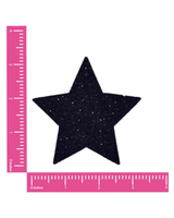 Black star-shaped glitter pasty, perfect for rave outfits and adding sparkle to your look.