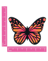 Large pink to orange ombre butterfly glitter nipple cover pastie for rave outfits by Neva Nude.