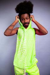 Model in a vibrant green sleeveless hooded top and matching shorts from Freedom Rave Wear, featuring psychedelic patterns. - 3