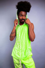 Model in a vibrant green sleeveless hooded top and matching shorts from Freedom Rave Wear, featuring psychedelic patterns.-4 