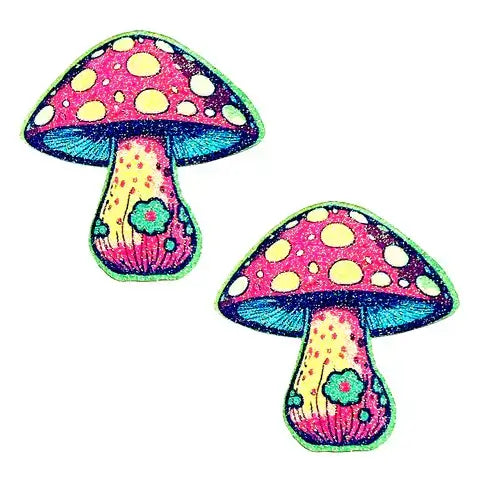 Amanita Dreamin Glitter Shroom Nipple Cover Pasties set, featuring two colorful mushroom-shaped pasties with glitter details, ideal for festival or rave looks.