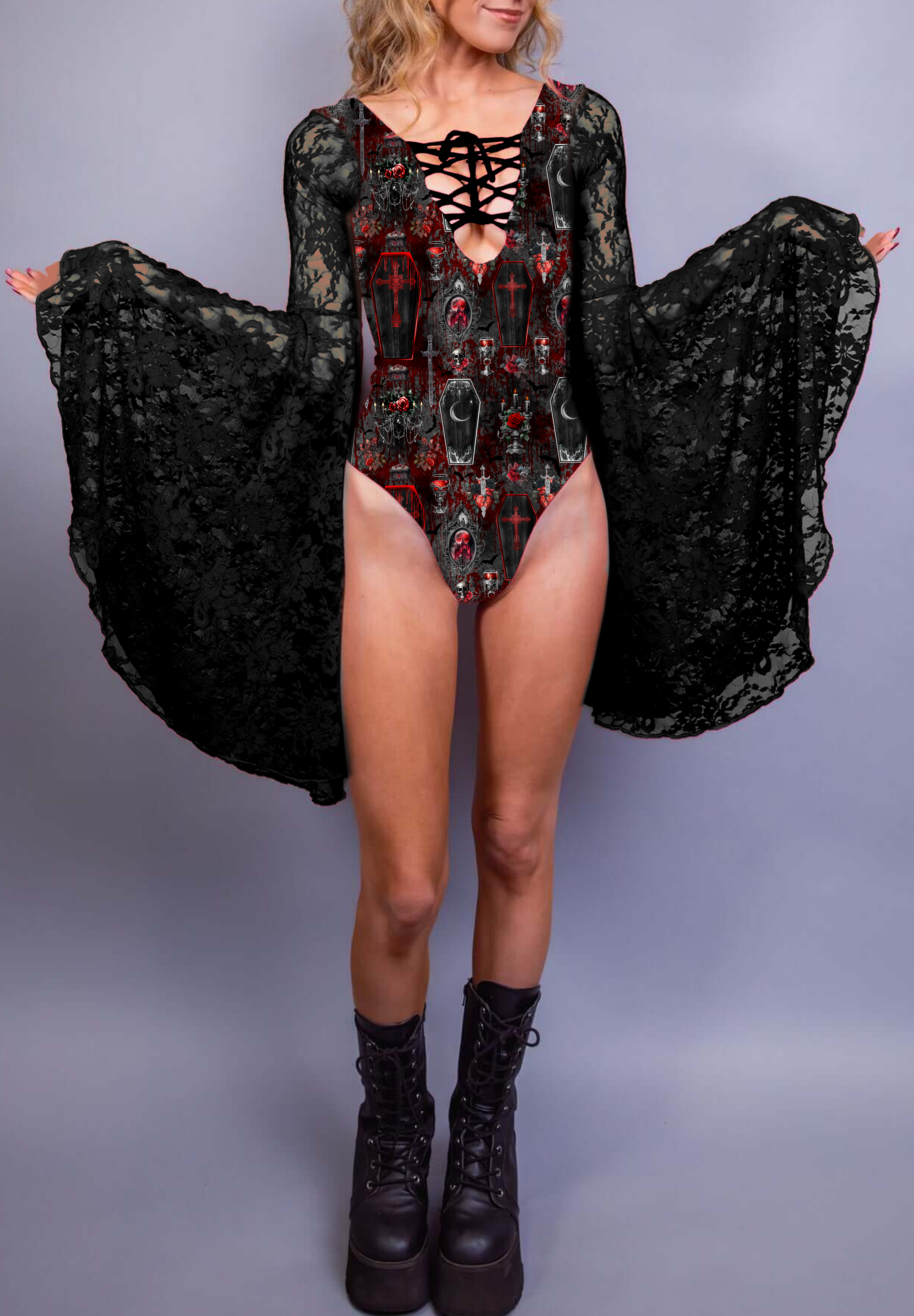 Black and red bodysuit featuring gothic coffin and cross designs, paired with lace sleeves for an ethereal yet edgy look.