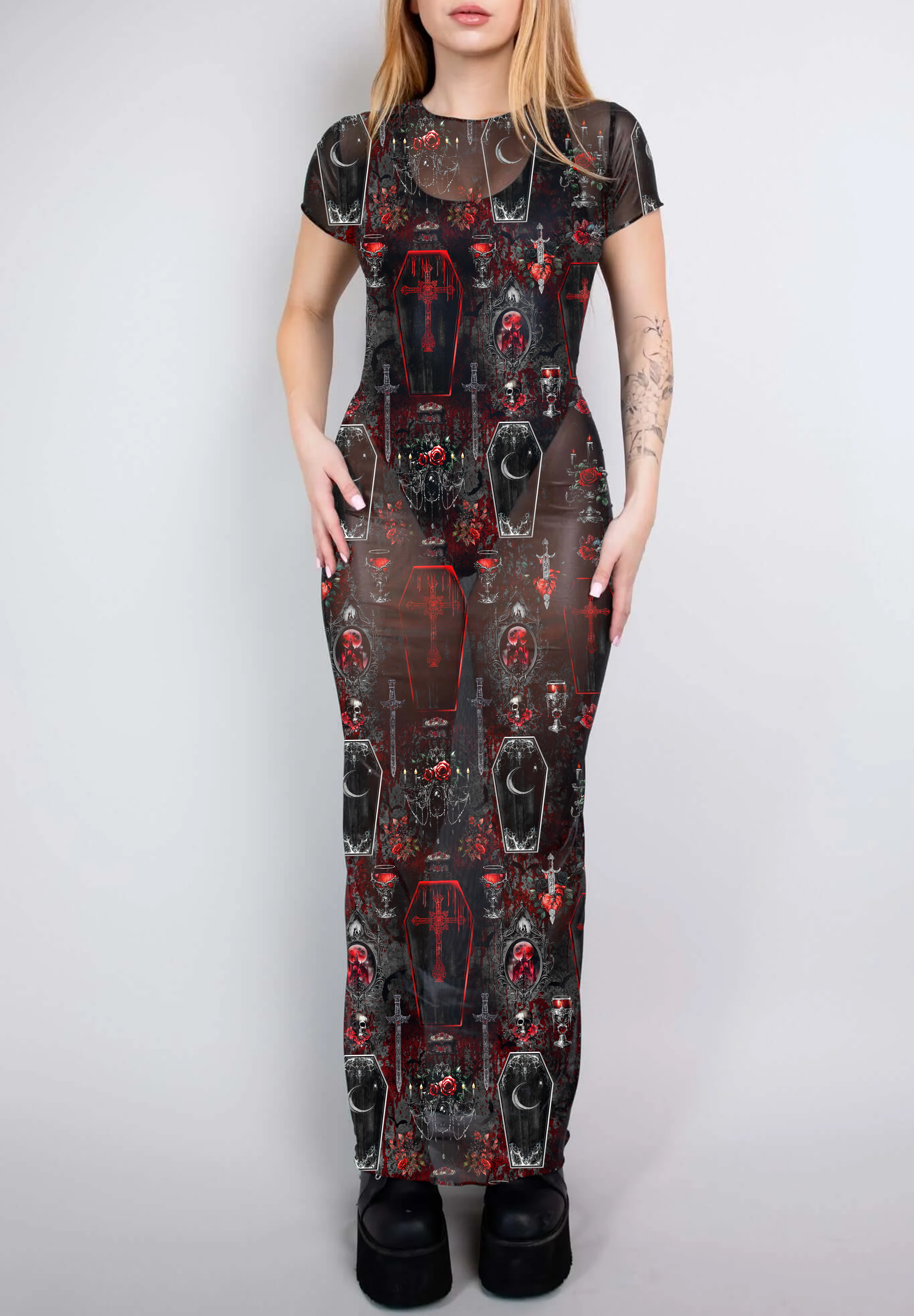 A full-length sheer mesh dress with a red and black coffin and cross pattern, offering a dark, vampiric elegance.