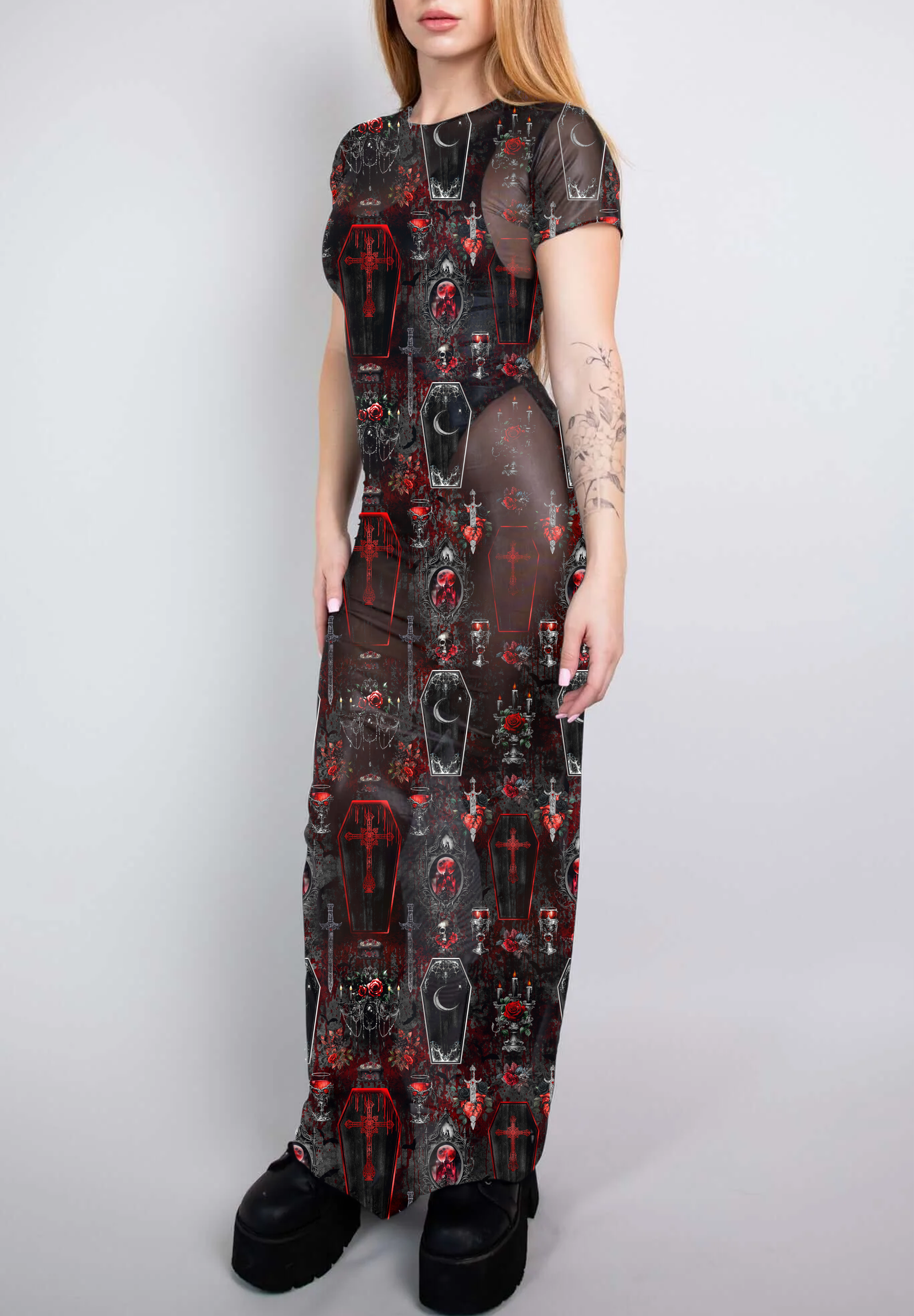 A full-length sheer mesh dress with a red and black coffin and cross pattern, offering a dark, vampiric elegance.