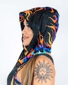 Side view of Blaze Assassin Hood with cosmic flame print, perfect for rave outfits and adding edge to your look.