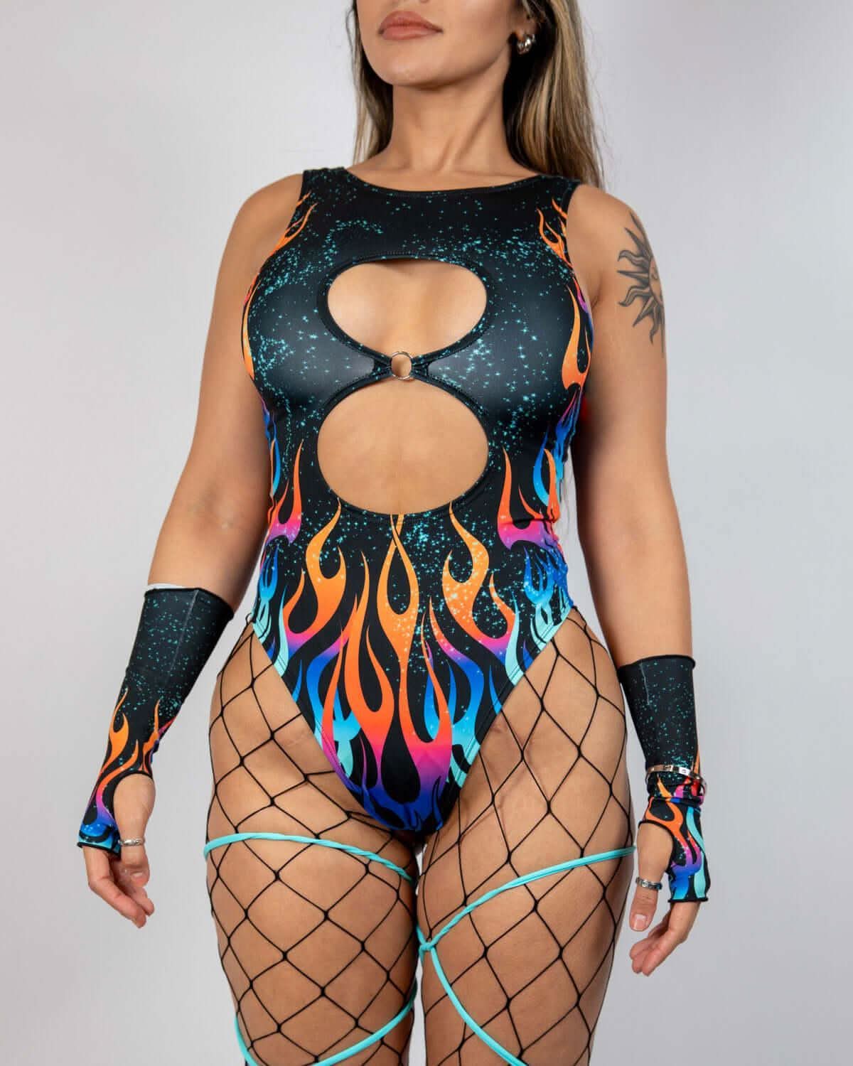 Flame-patterned Blaze Keyhole Bodysuit perfect for rave outfits, featuring double keyhole cutouts and O-ring detail.